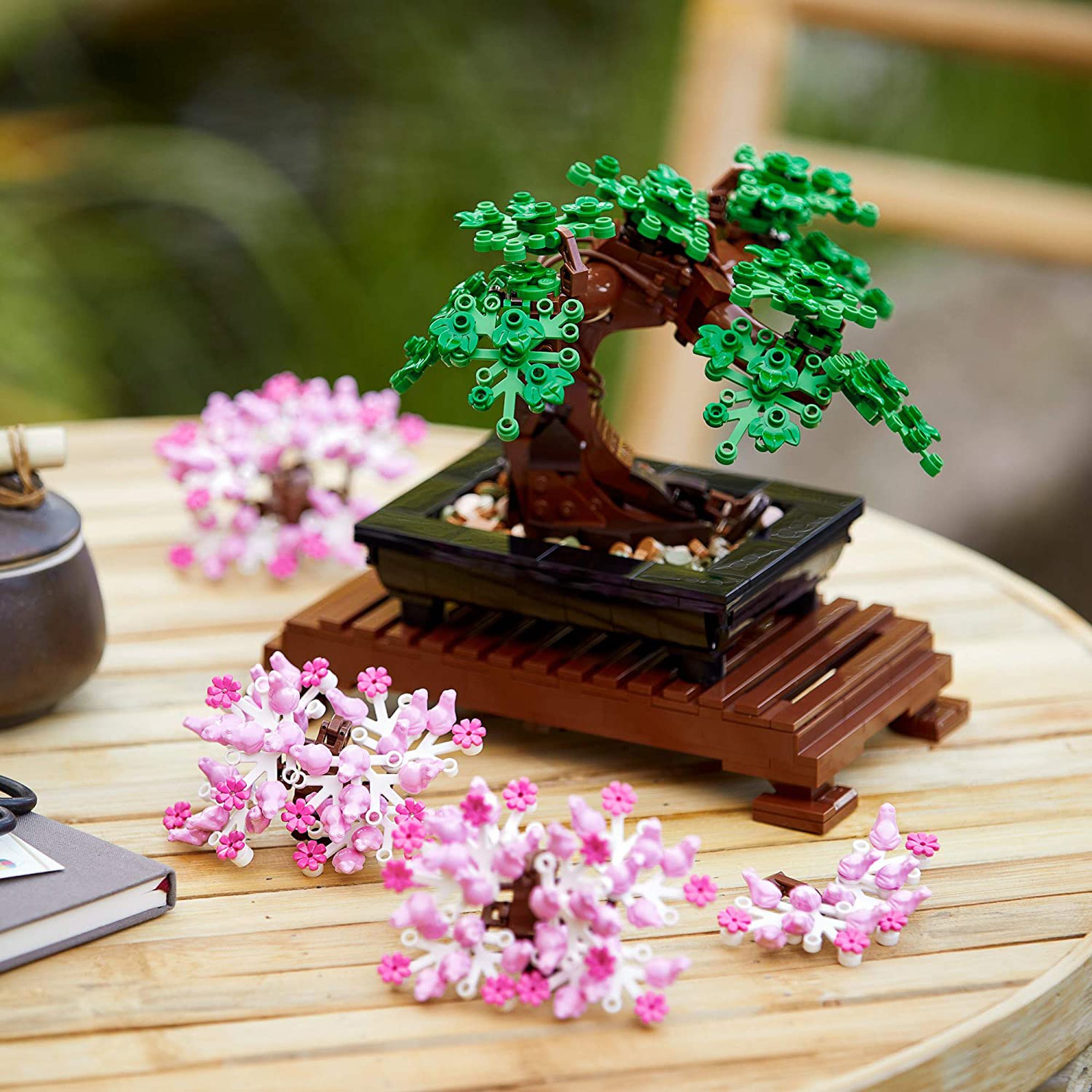 A fully assembled Lego Bonsai Tree set resting on a table.