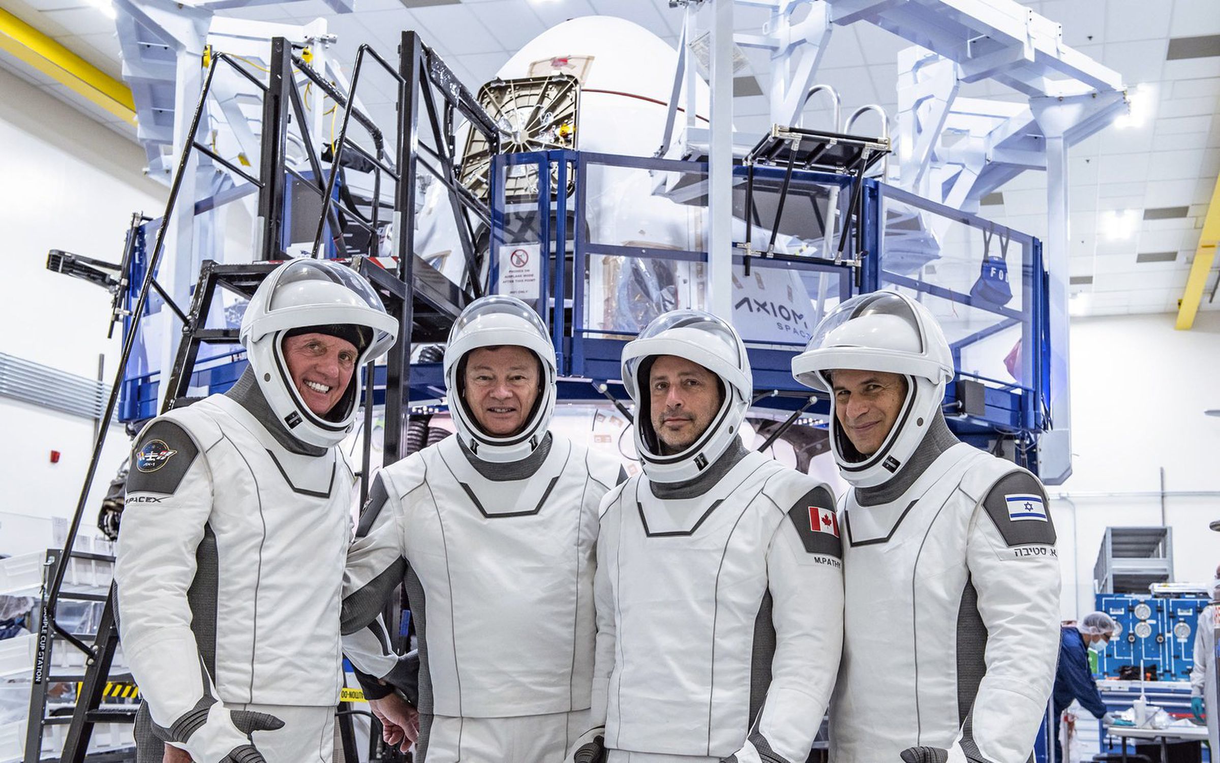 From L to R: Larry Connor, Michael López-Alegría, Mark Pathy, and Eytan Stibbe in their SpaceX pressure suits