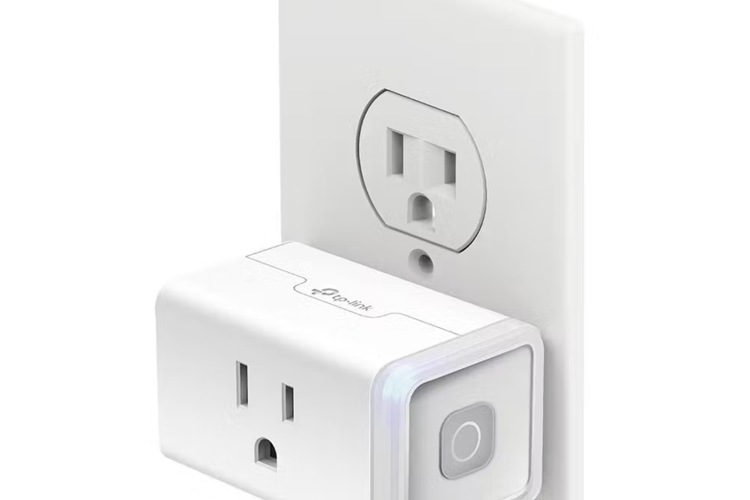 White plug plugged into electrical socket.