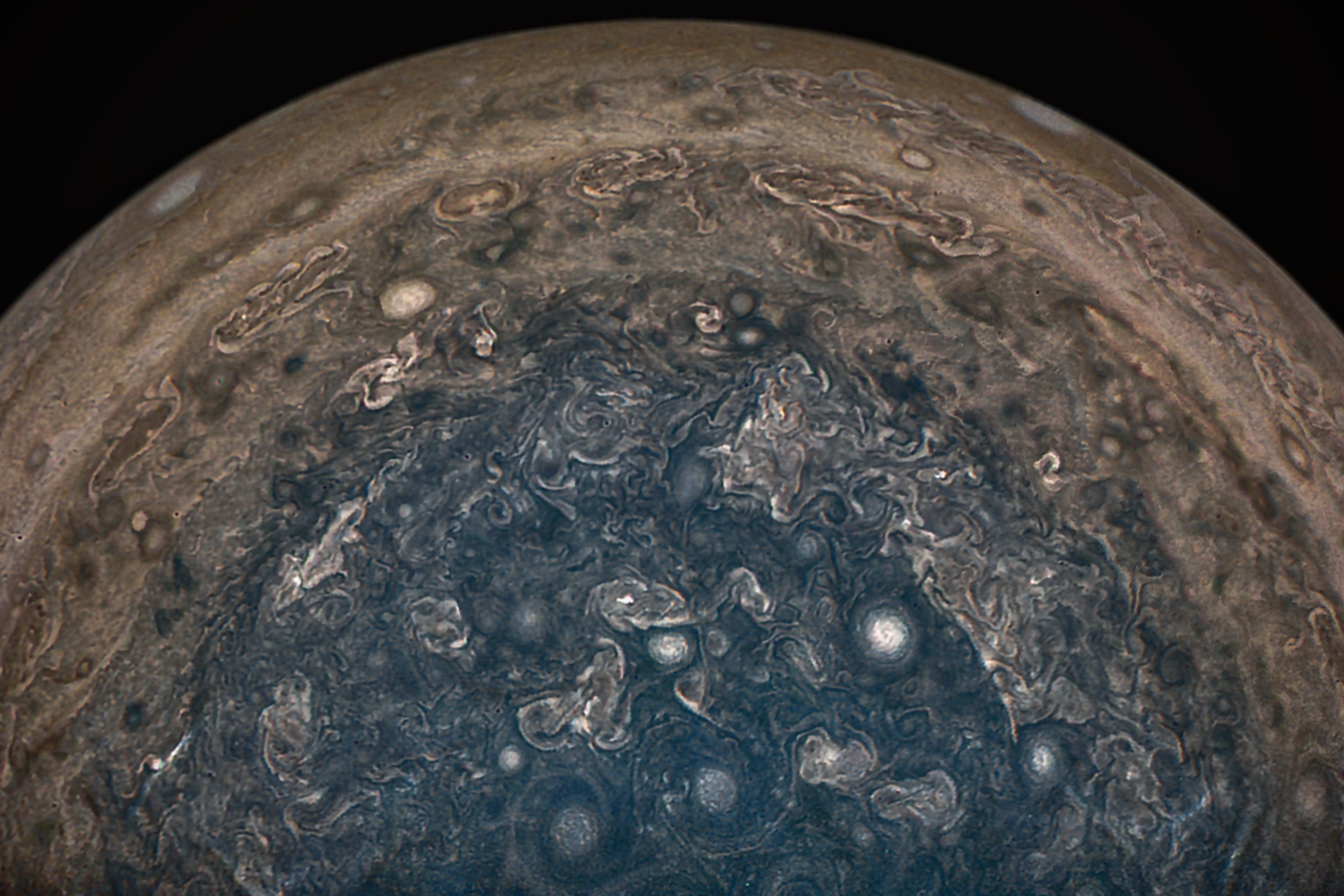 The storms at Jupiter’s poles, as seen by NASA’s Juno spacecraft.