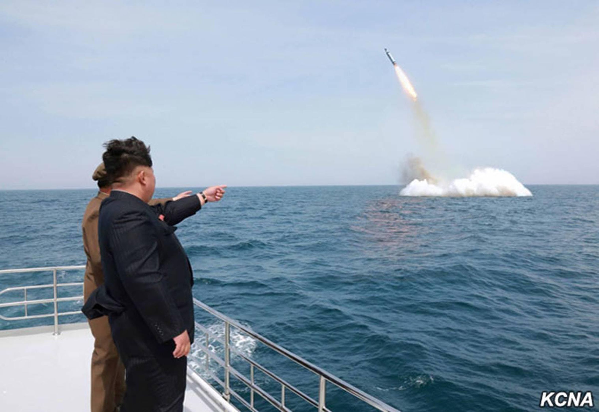 Photograph of a submarine-launched ballistic missile test-fire in 2015 that North Korea claimed was successful. (Photo from KCNA)