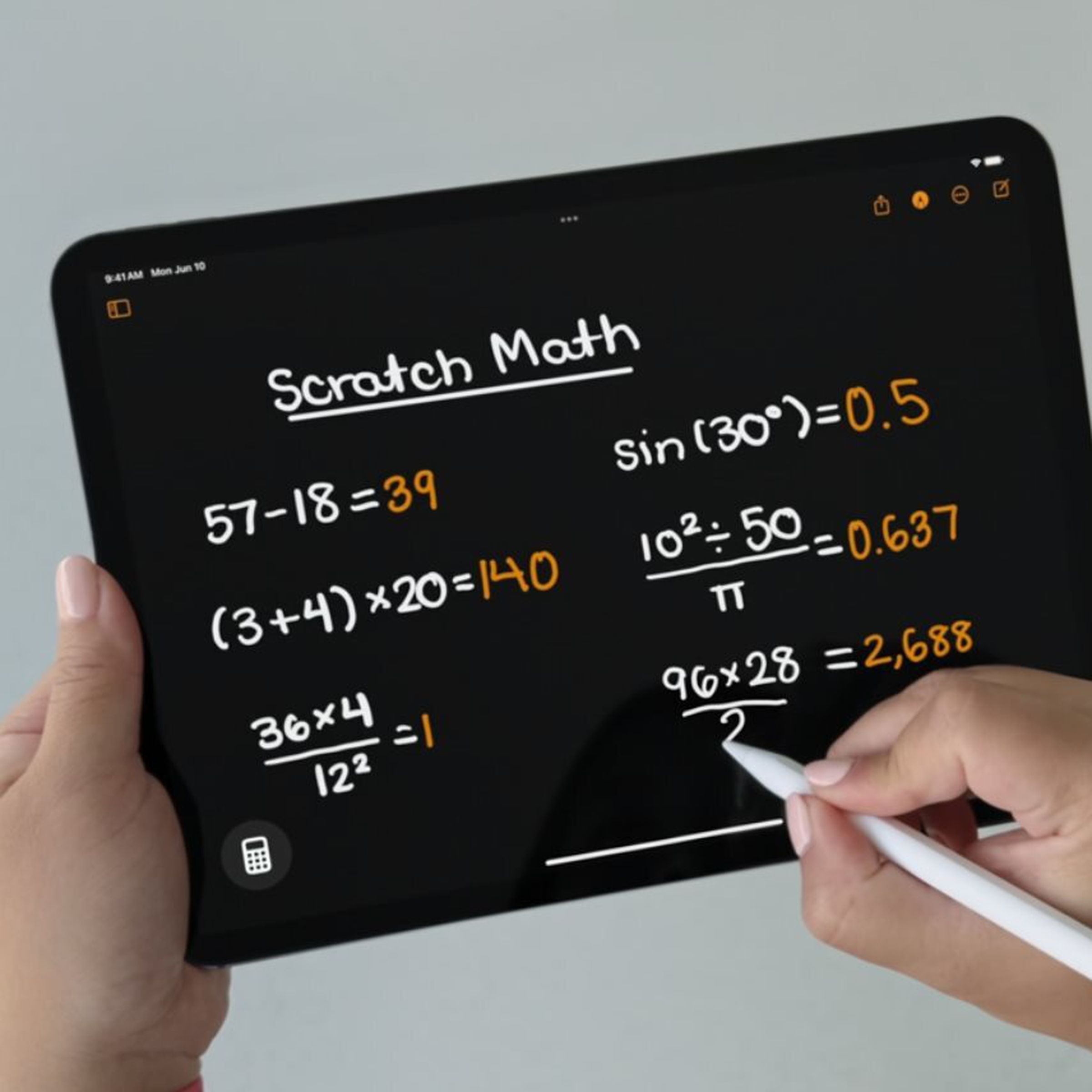 A person uses Apple’s Calculator app for iPad with their Apple Pencil.