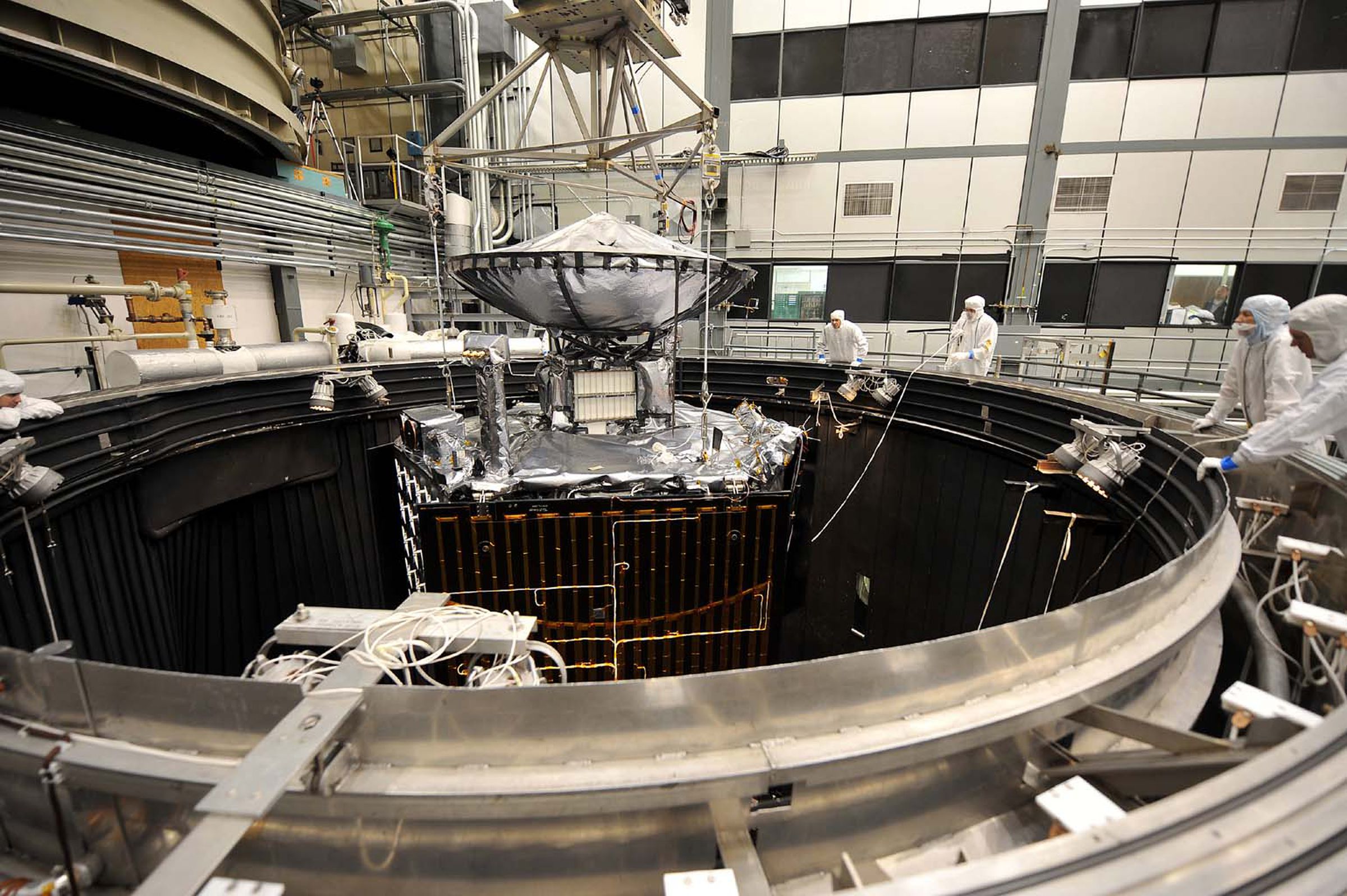 JPL is equipped with various test facilities, such as a giant vacuum chamber used to subject spacecraft to extreme environments.