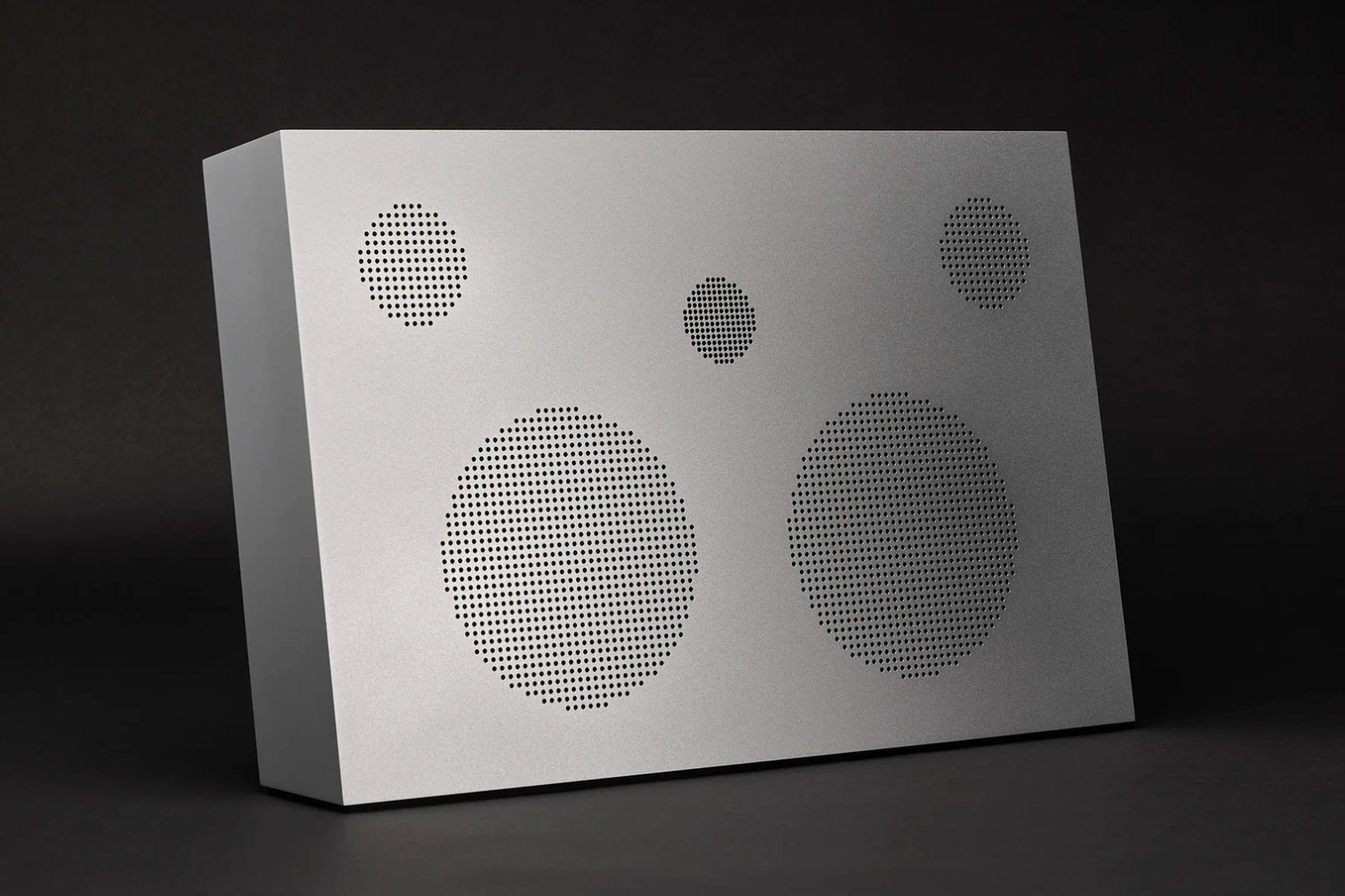 The all-metal Nocs Labs Monolith x Aluminum speaker in a silver finish.