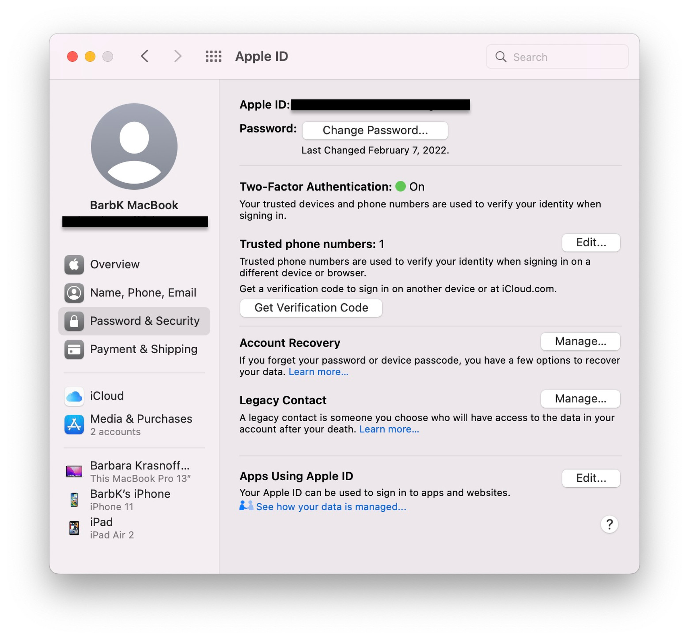Apple ID security page with options to change passwords, select trusted phone numbers, and others.