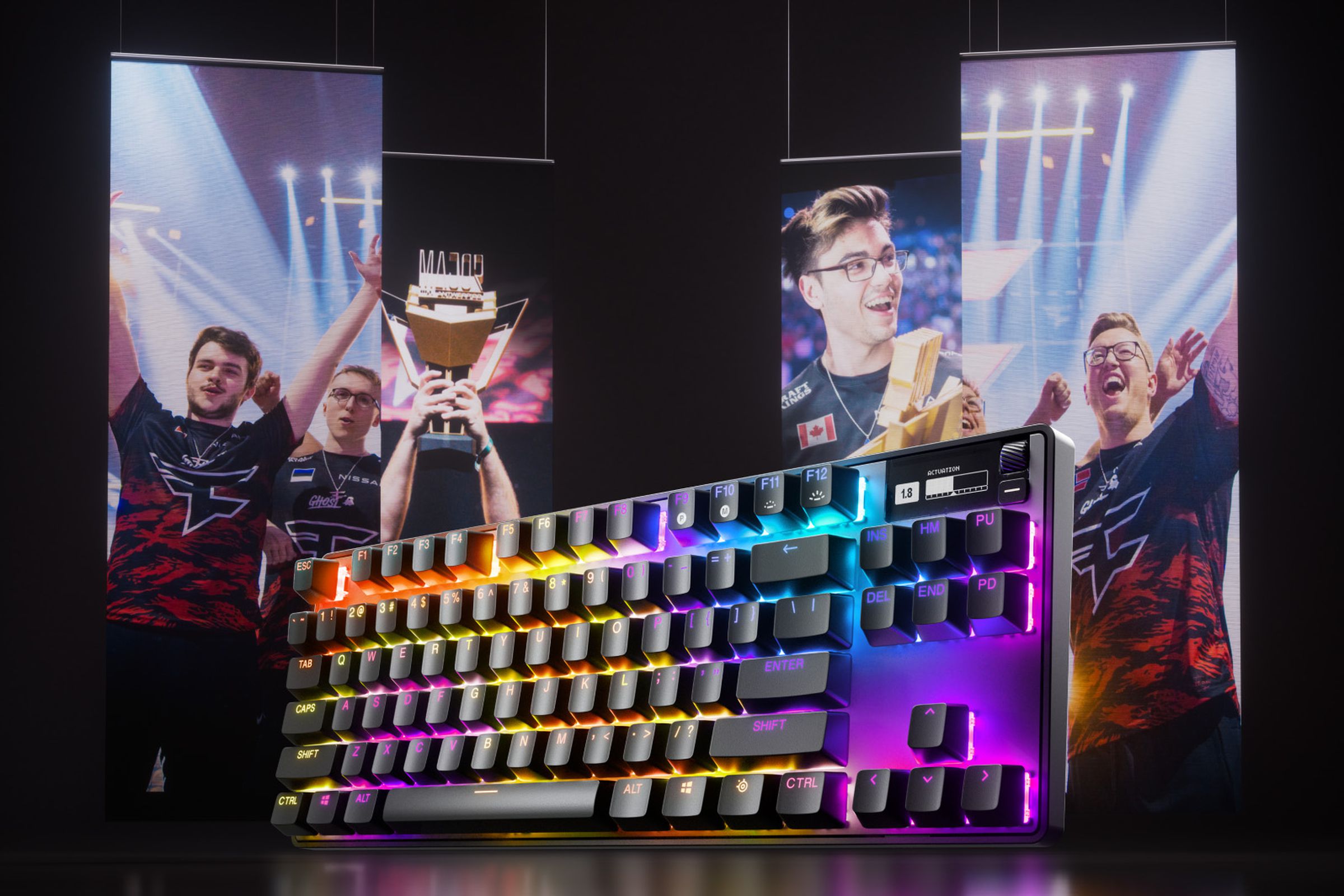 Apex Pro TKL in front of several eSports stars.