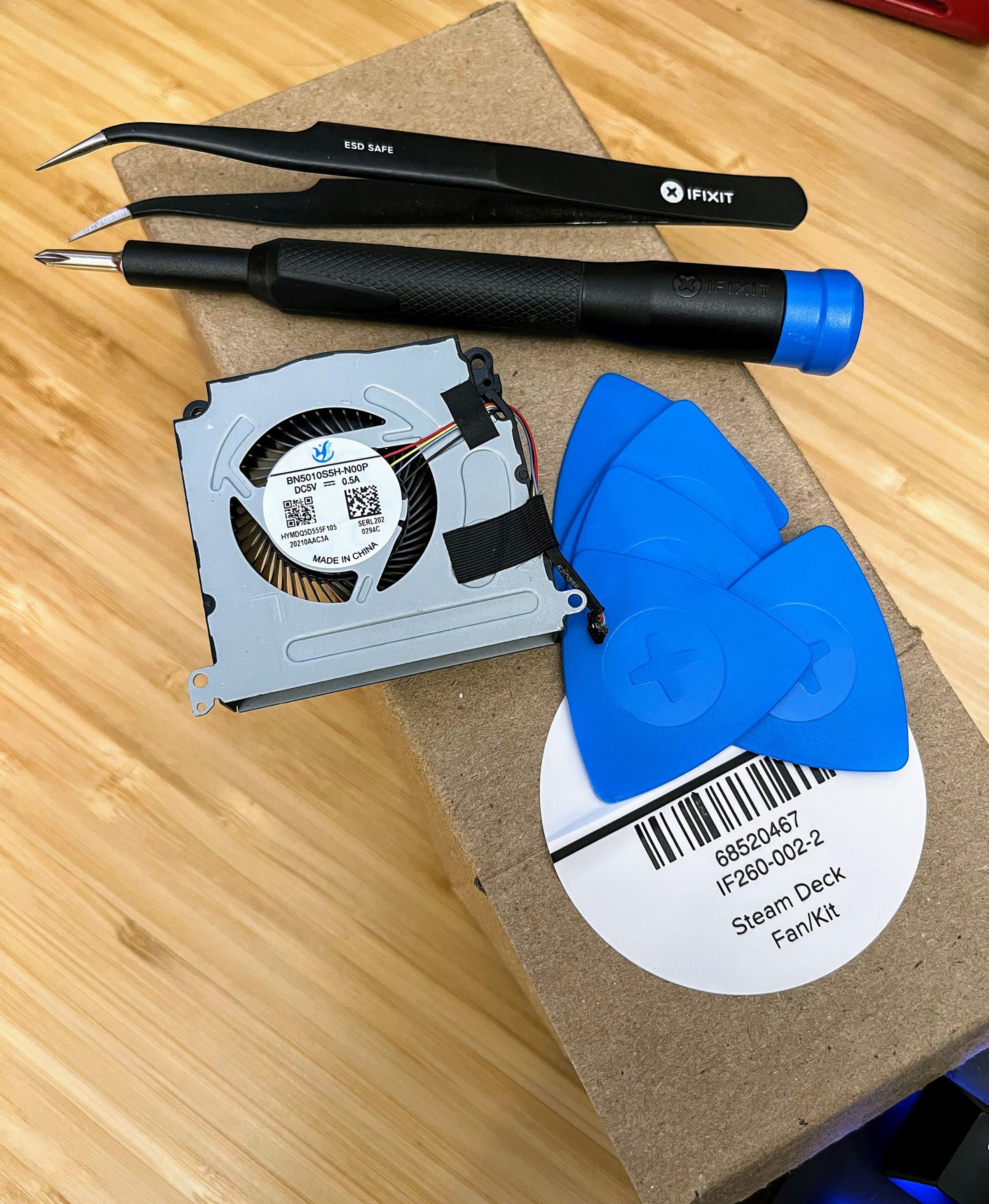 The $30 iFixit kit comes with picks to open the Deck, a screwdriver and ESD-safe tweezers, and the fan.