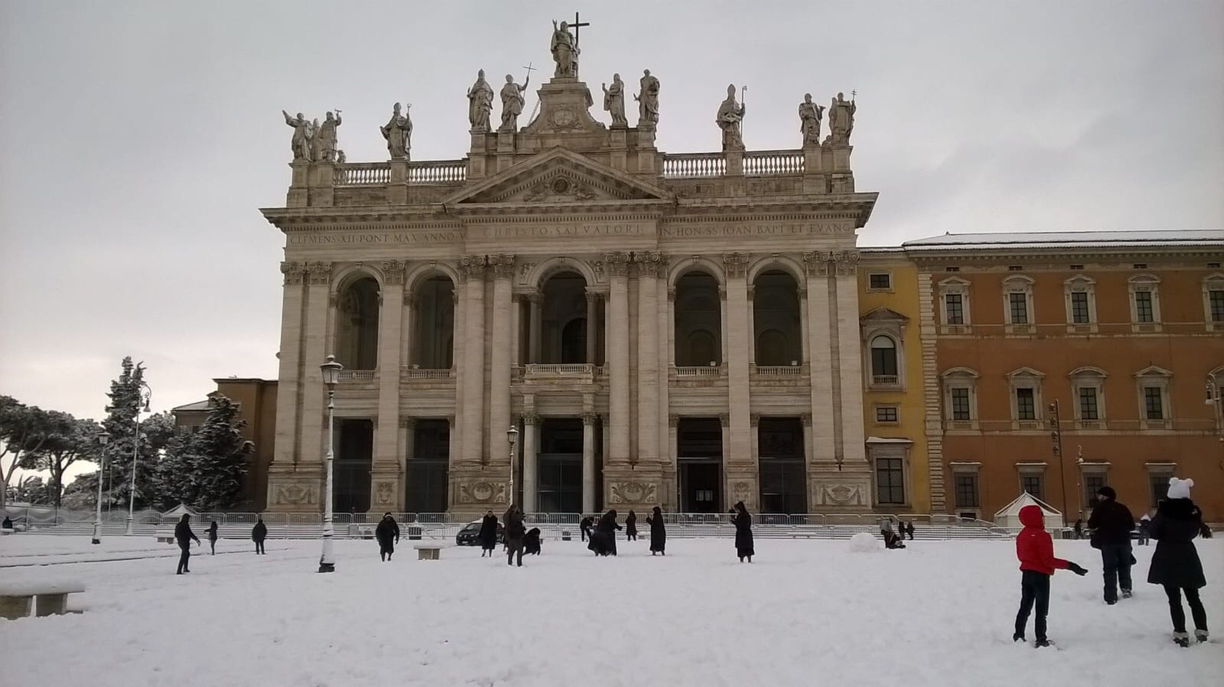 Basilica of St. John Lateran, with nuns playing outside in the snow