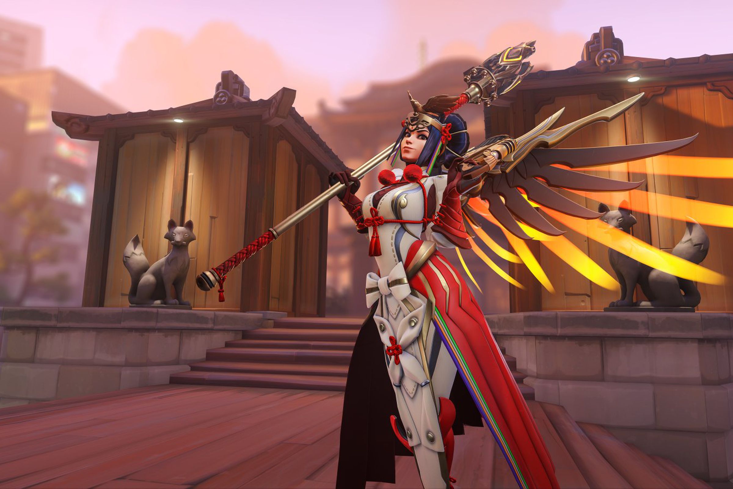 Image of Overwatch 2 character “Mercy” posing as a winged angel, complete with her staff.