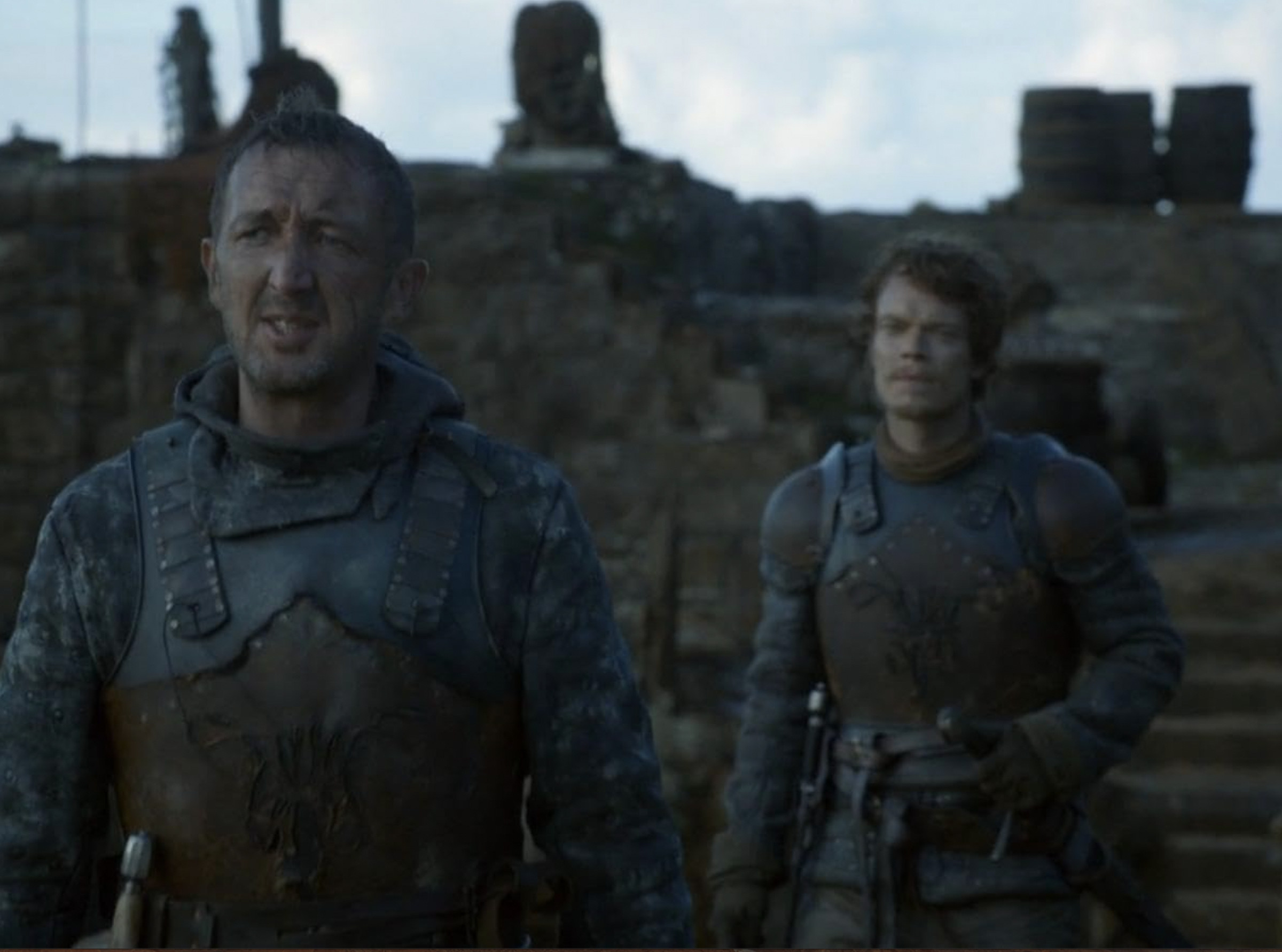 Screenshot from Game of Thrones featuring the actors Ralph Ineson and Alfrie Allen wearing armor