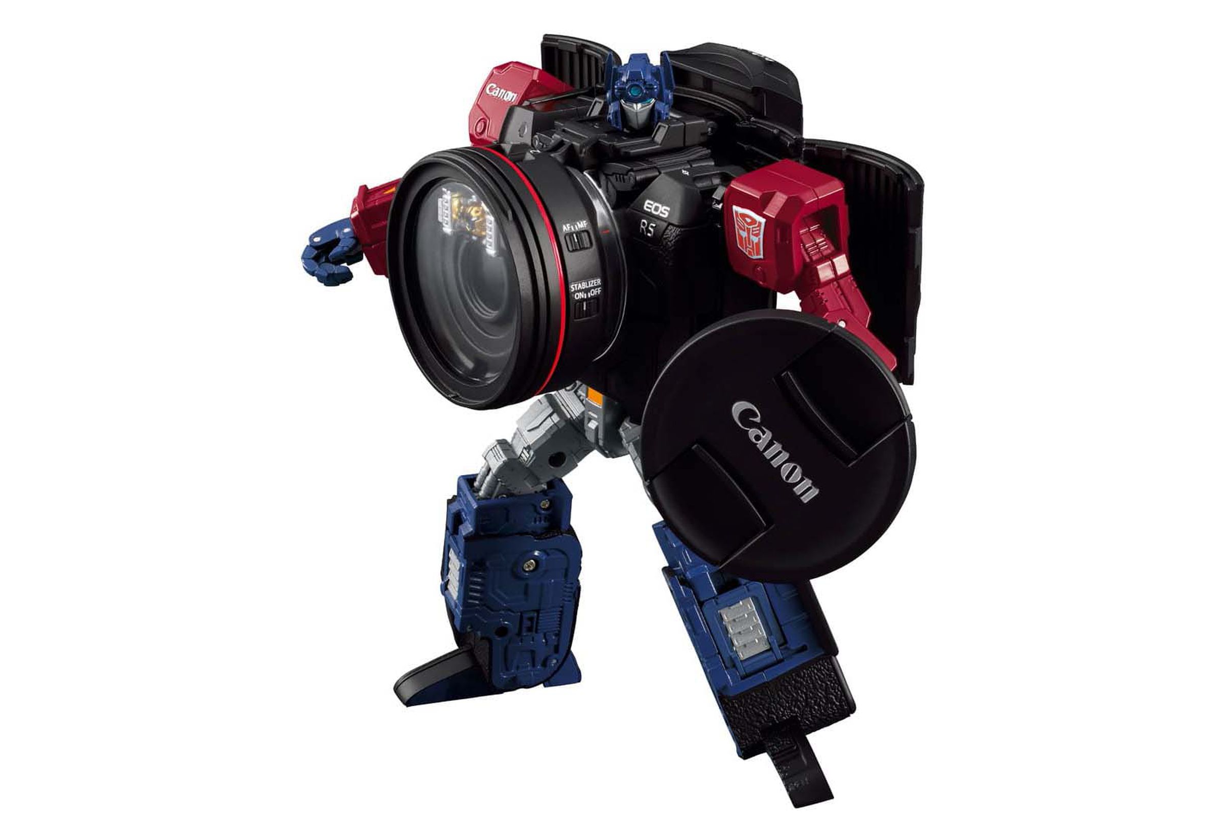 Optimus Prime, using a lens as a shield.