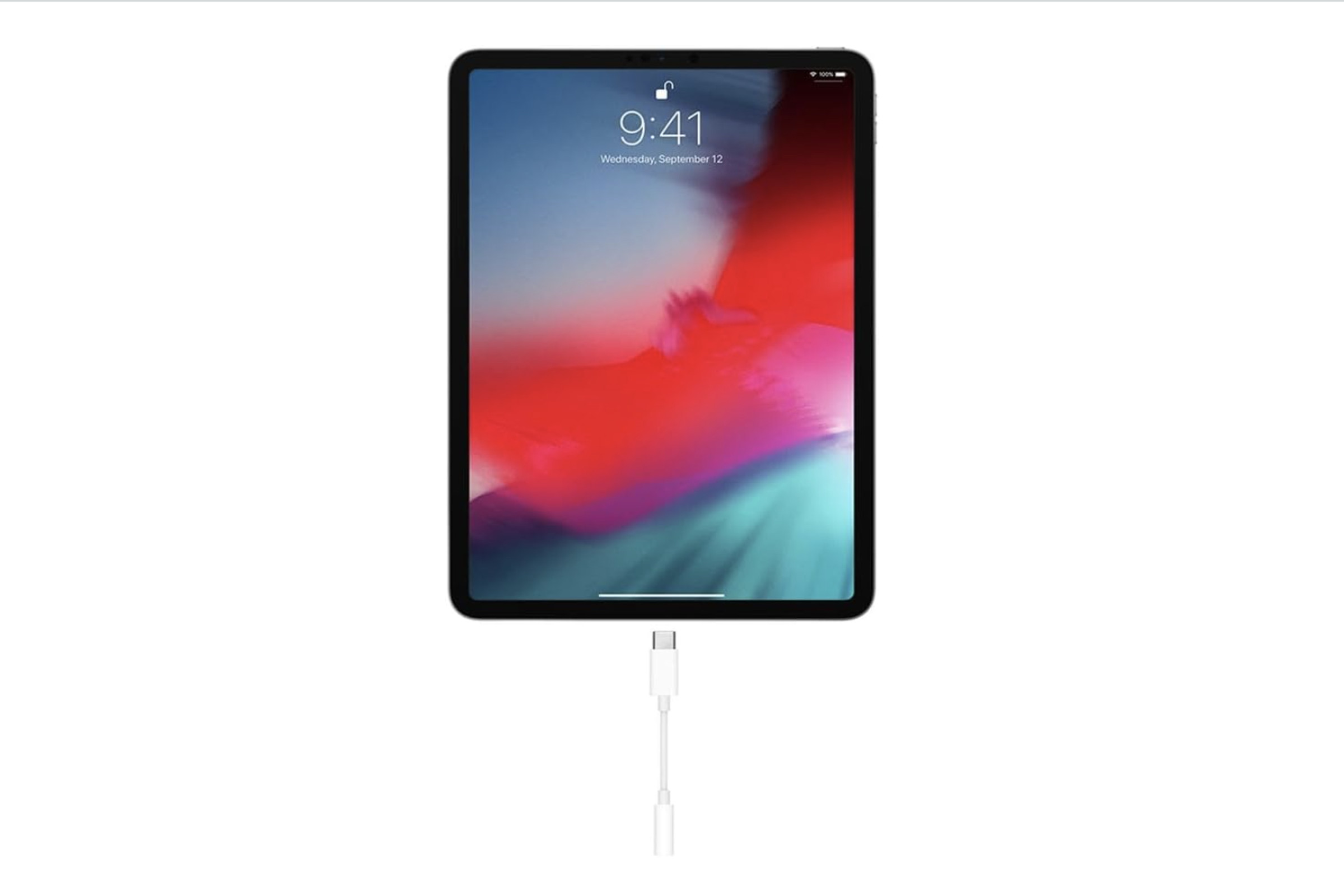 iPad with headphone jack adapter attached