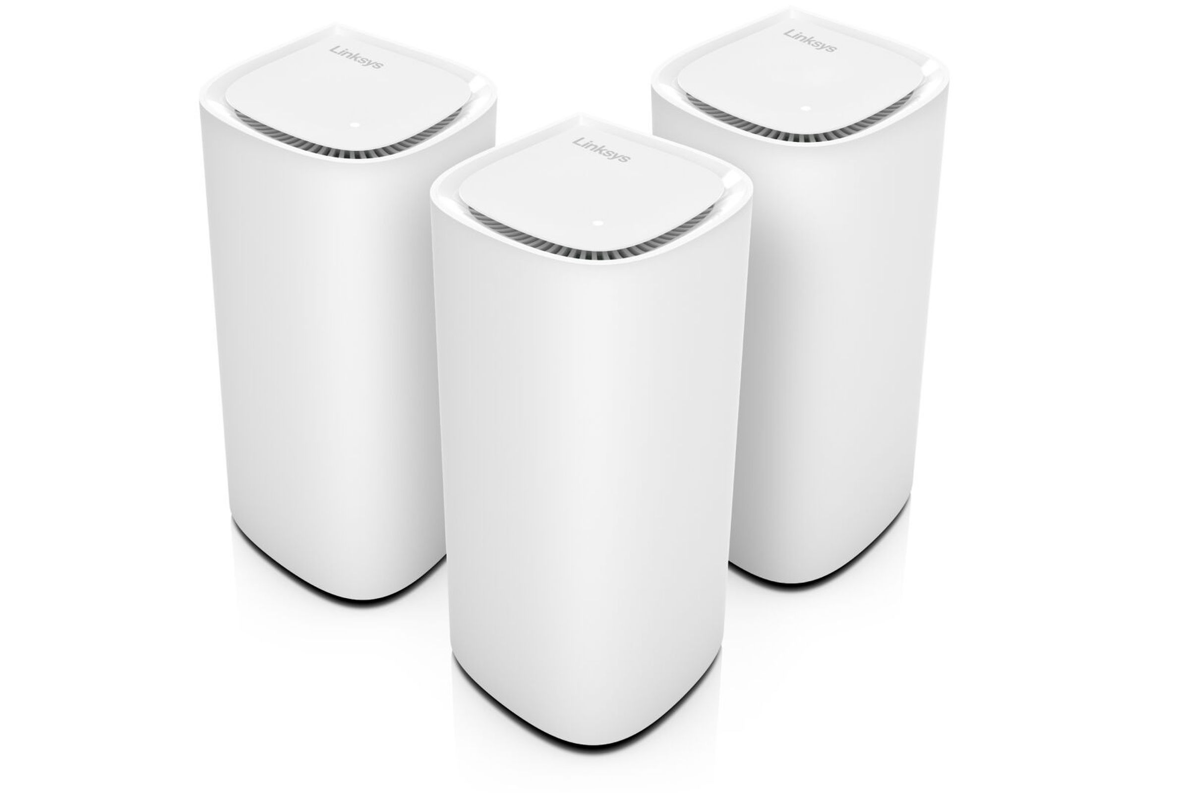 An image of a Velop Pro 7 three-pack arranged with one in front and two behind.
