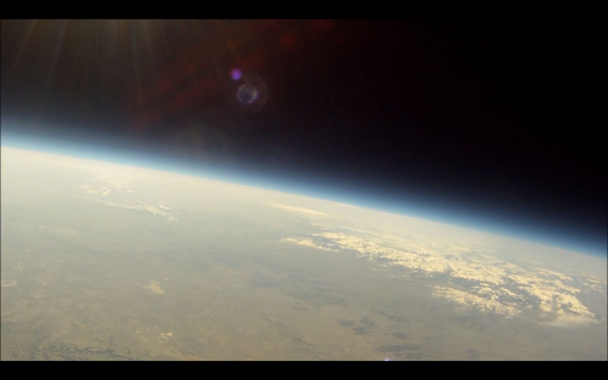 A photo taken from the stratosphere (84,000 feet up) during one of Montana Space Grant Consortium's high-altitude balloon tests in 2014.