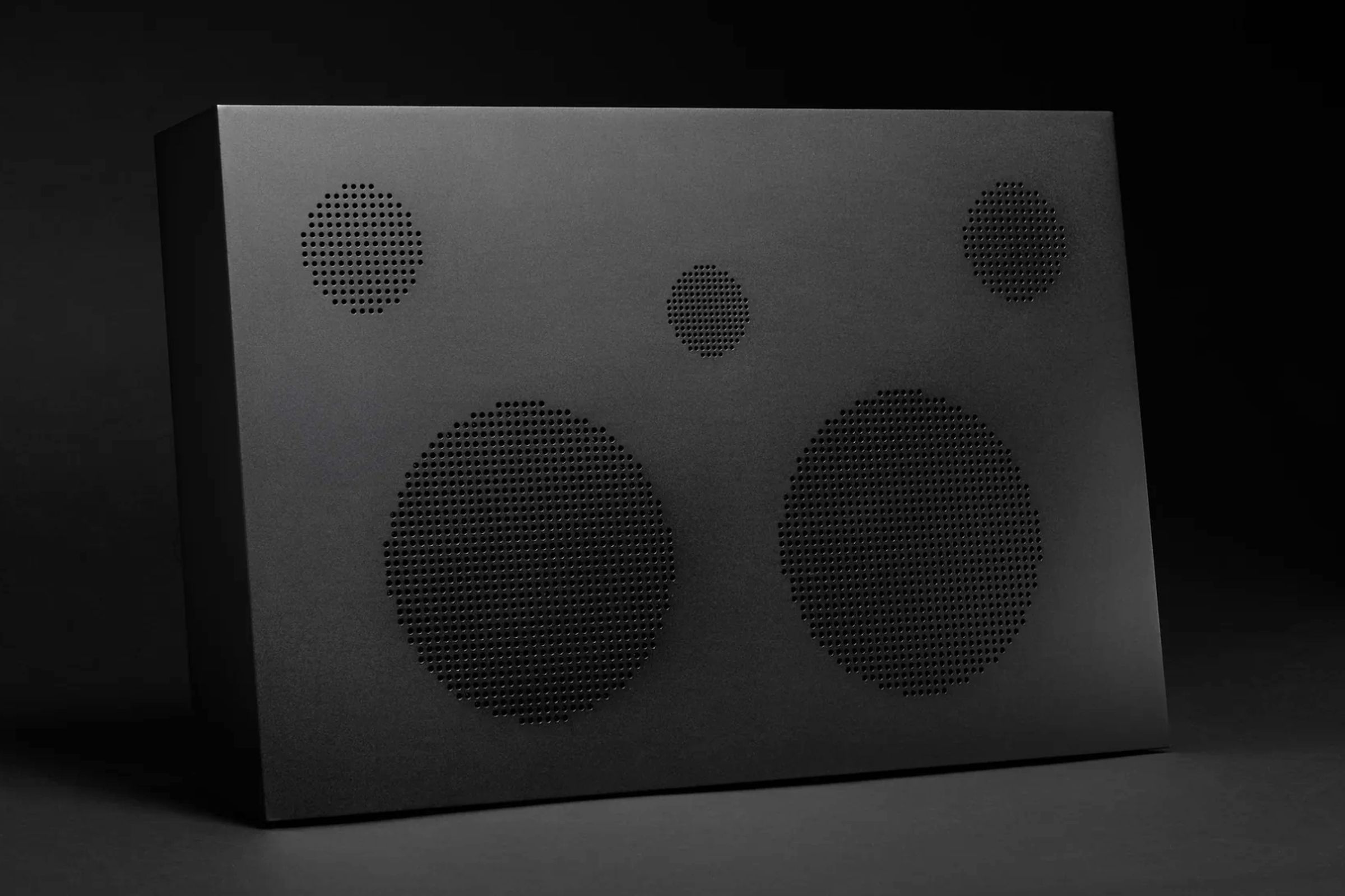 The all-metal Nocs Labs Monolith x Aluminum speaker in a matte black finish.