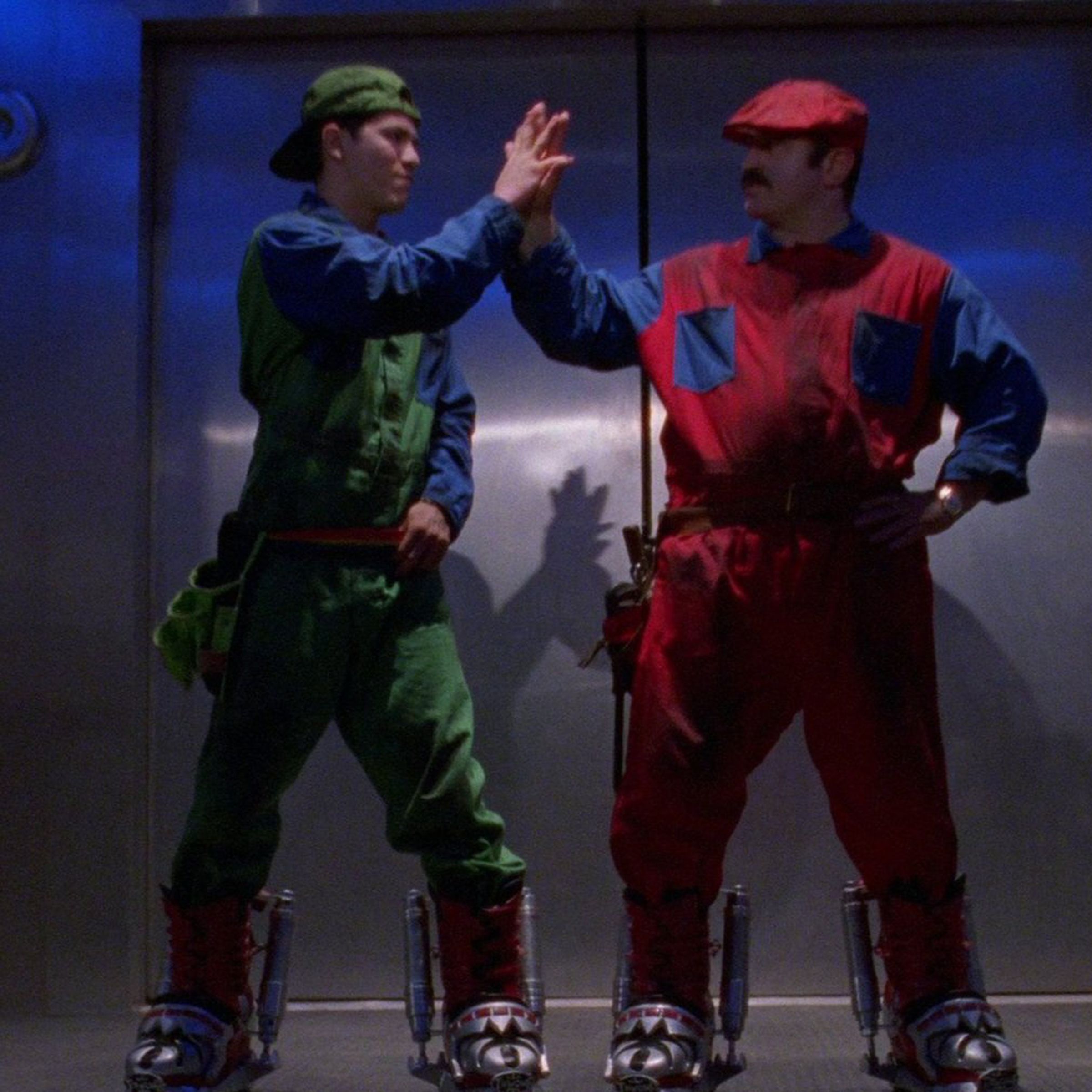 A still photo of John Leguizamo and Bob Hoskins in Super Mario Bros.