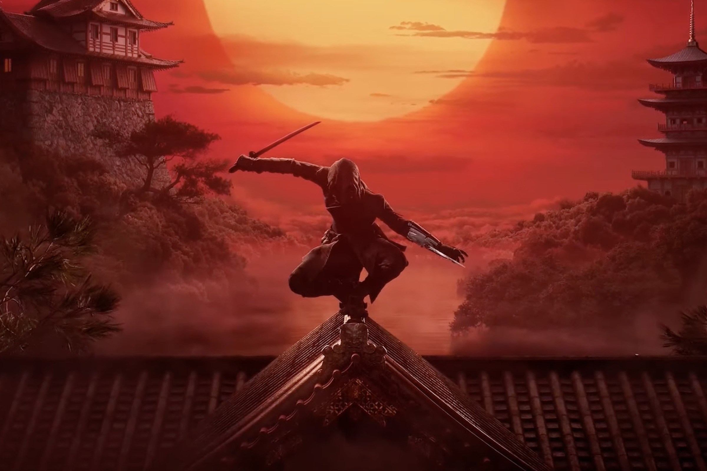 Key art from Ubisoft’s next Assassin’s Creed game, Assassin’s Creed Shadows featuring a ninja brandishing a sword and a hidden blade perched on a Japanese temple set against a red sky and blazing sun.