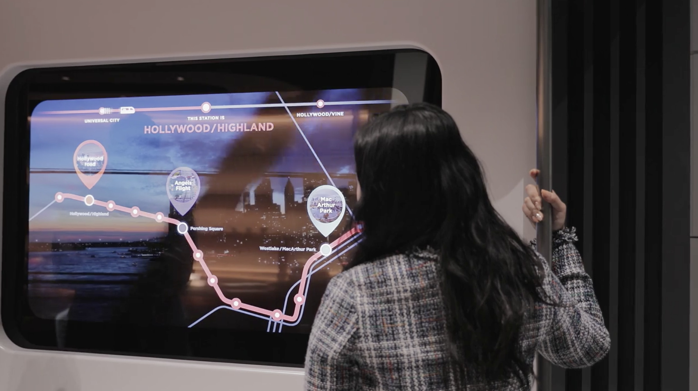 LG Display imagines its transparent OLED display outside the home, as both a subway window and display in a public transportation setting. 
