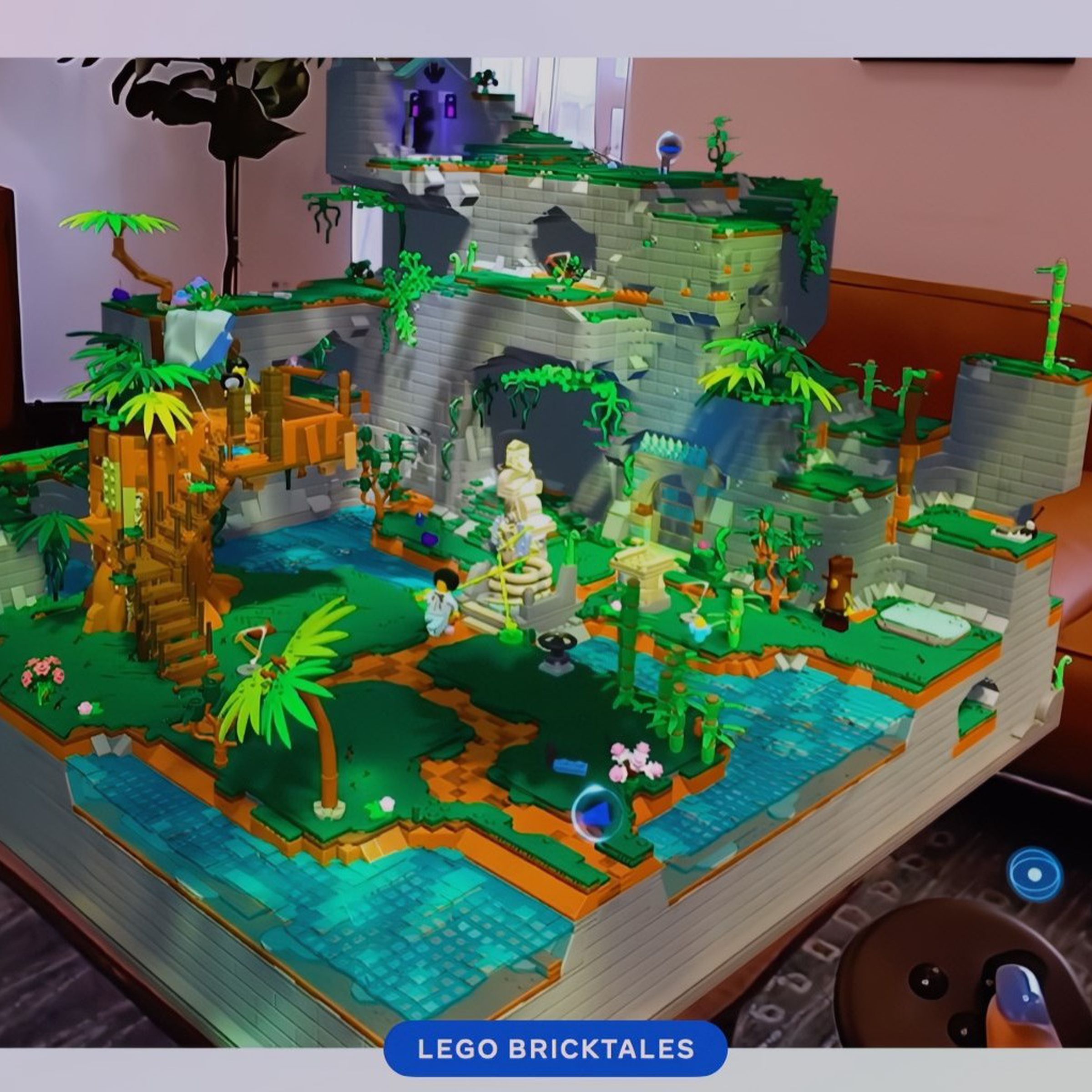 A virtual lego island paradise on a real-world living room table, with a couch in the background