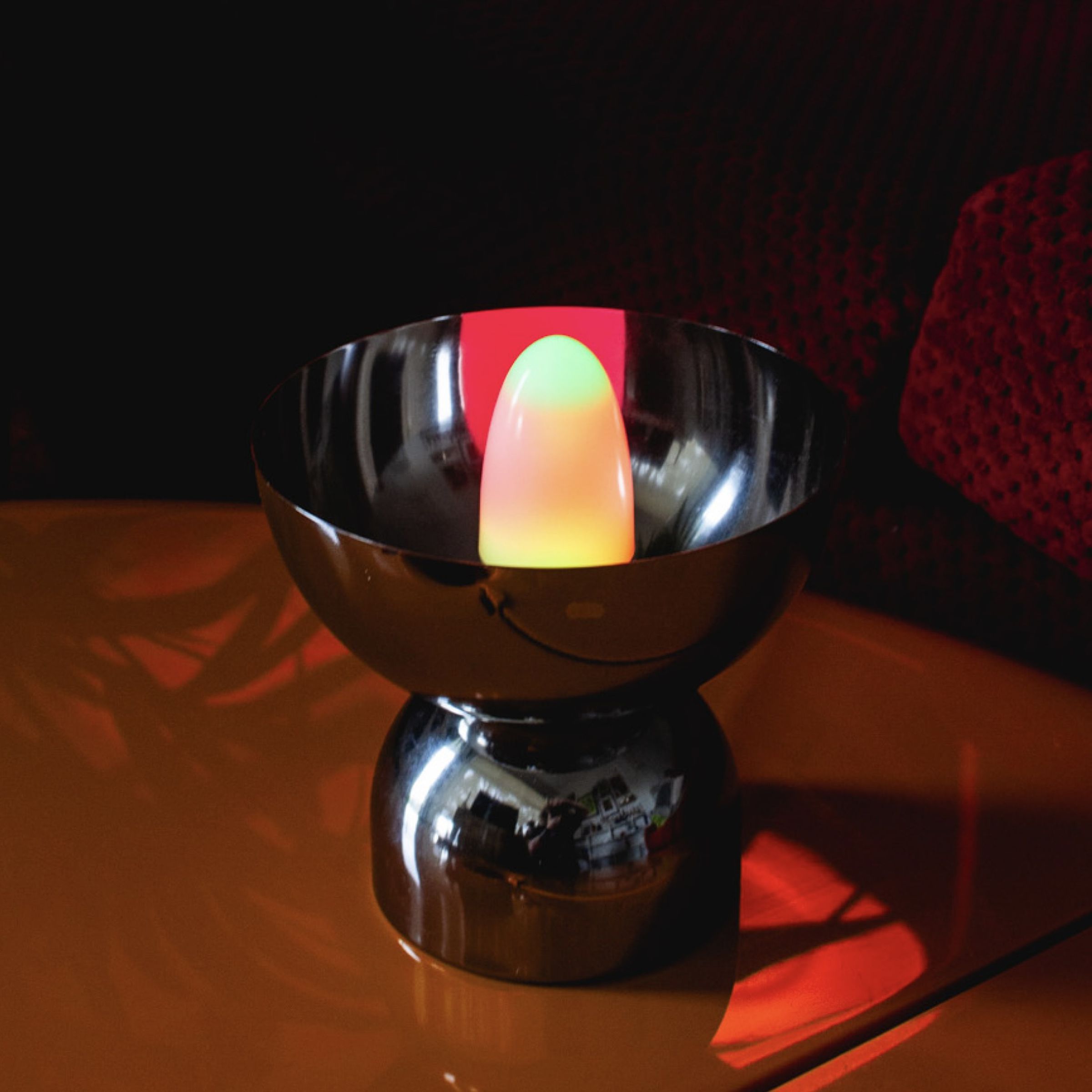 The B10 Candle set up like a spooky candy corn looking table light.