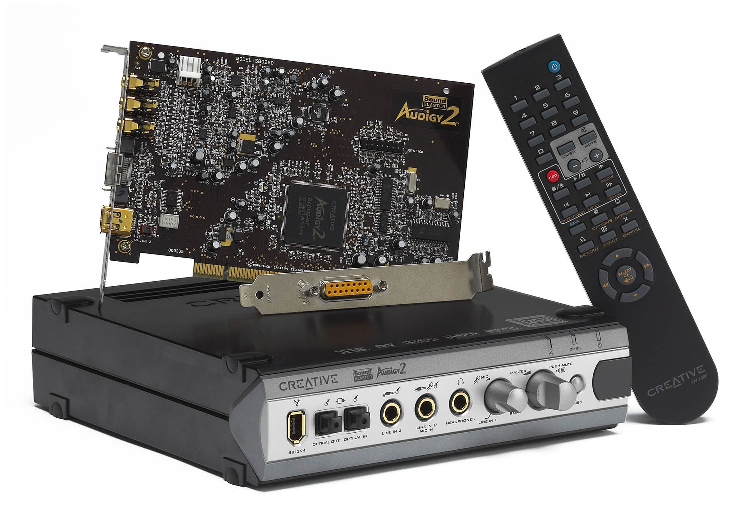 Photo of the Audigy 2 ZS Platinum Pro sound card with its outer box and remote control.