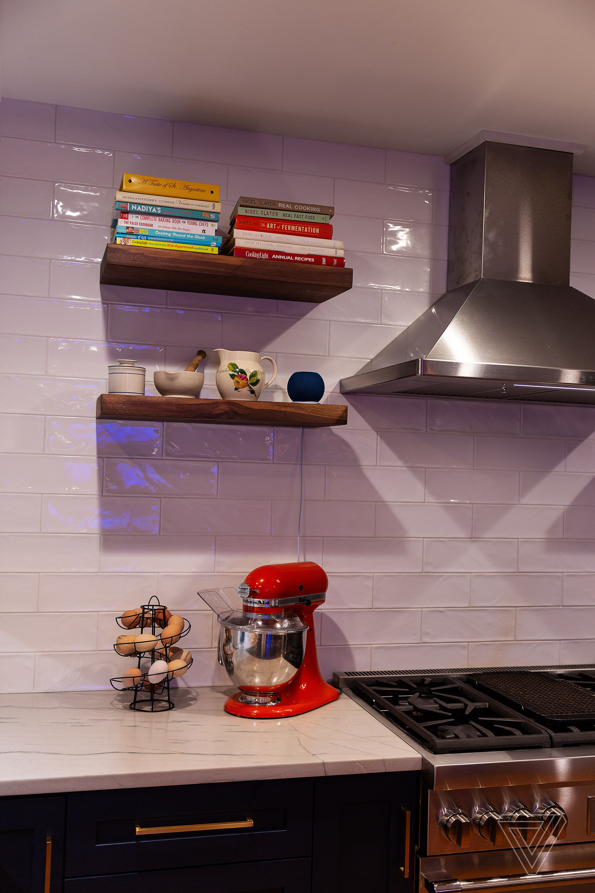 The blue HomePod Mini is a perfect match in my kitchen.