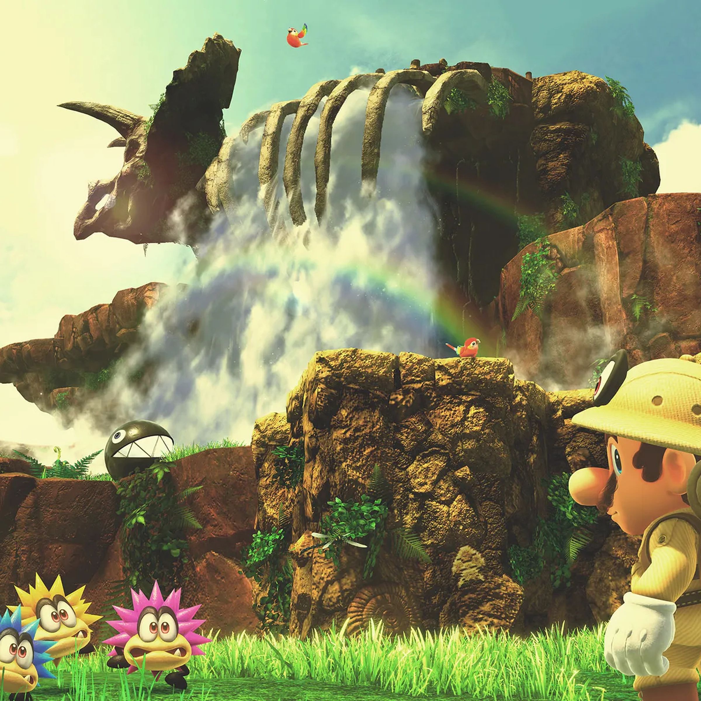 An image of Mario standing in front of dinosaur bones and a waterfall wearing attire for a safari.
