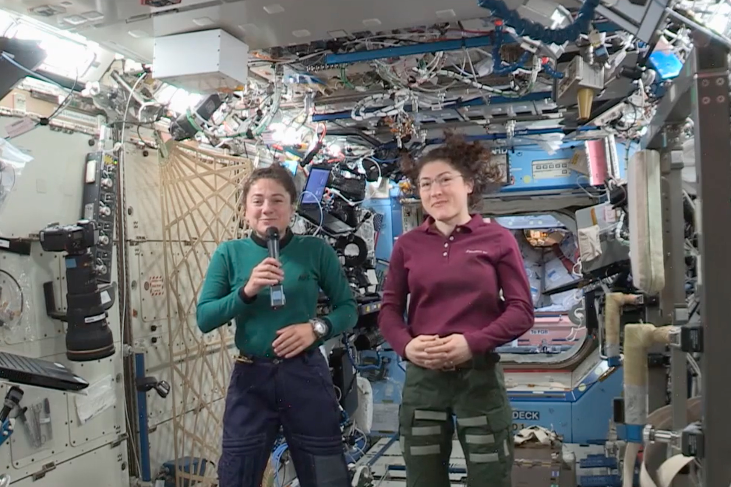 NASA astronauts Jessica Meir (L) and Christina Koch (R).
