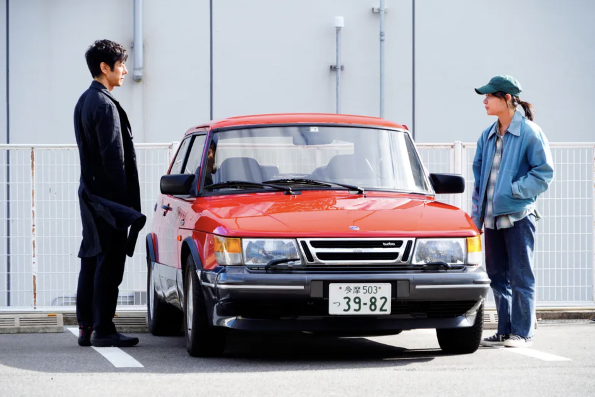 Actors Hidetoshi Nishijima&nbsp;and Tôko Miura with the titular car