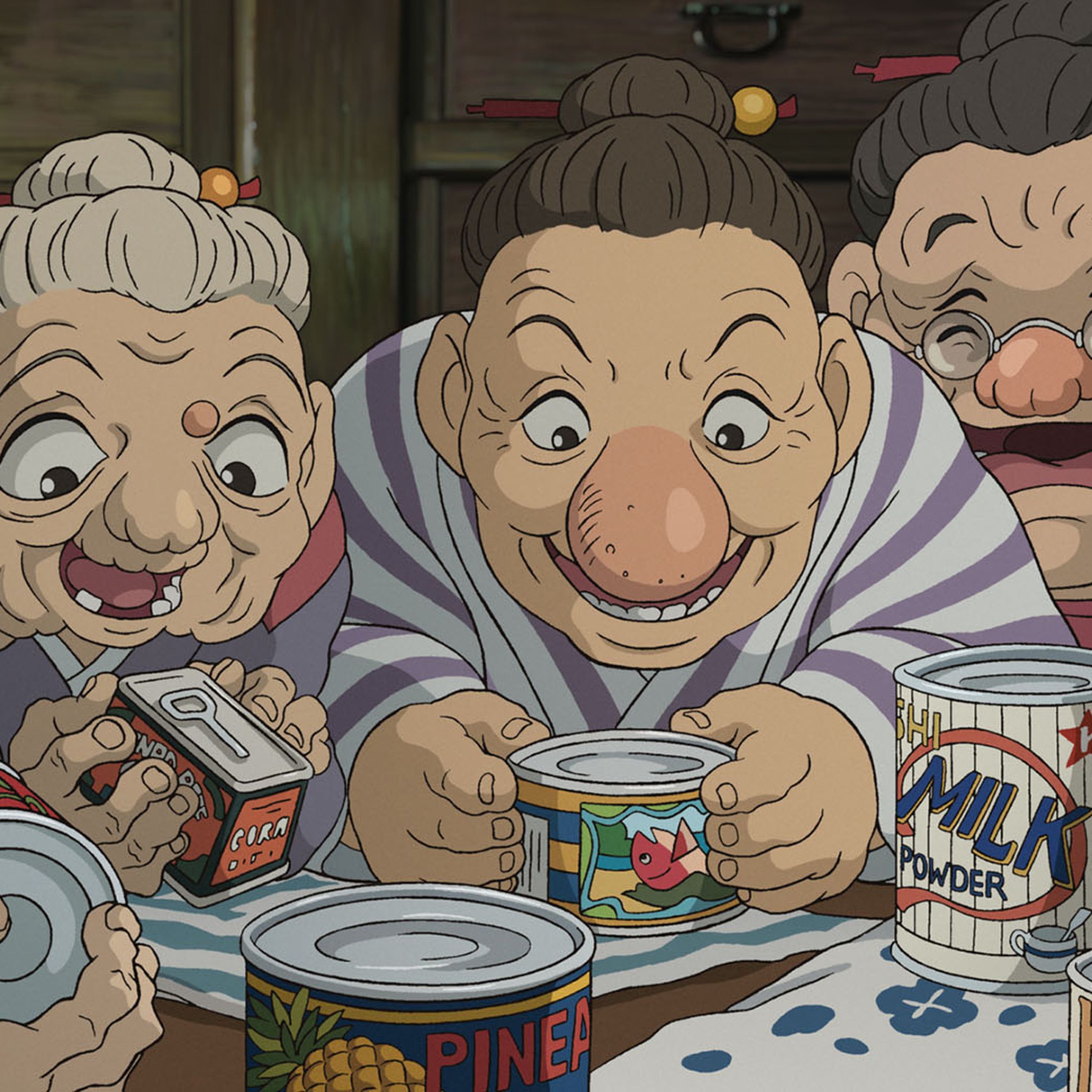 A group of excited old women clustered around a table together as they admire an assortment of canned goods.