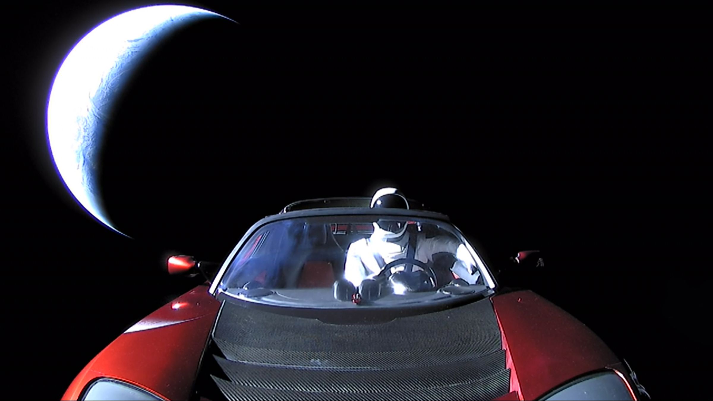 The Tesla roadster, launched on top of SpaceX’s Falcon Heavy, in space