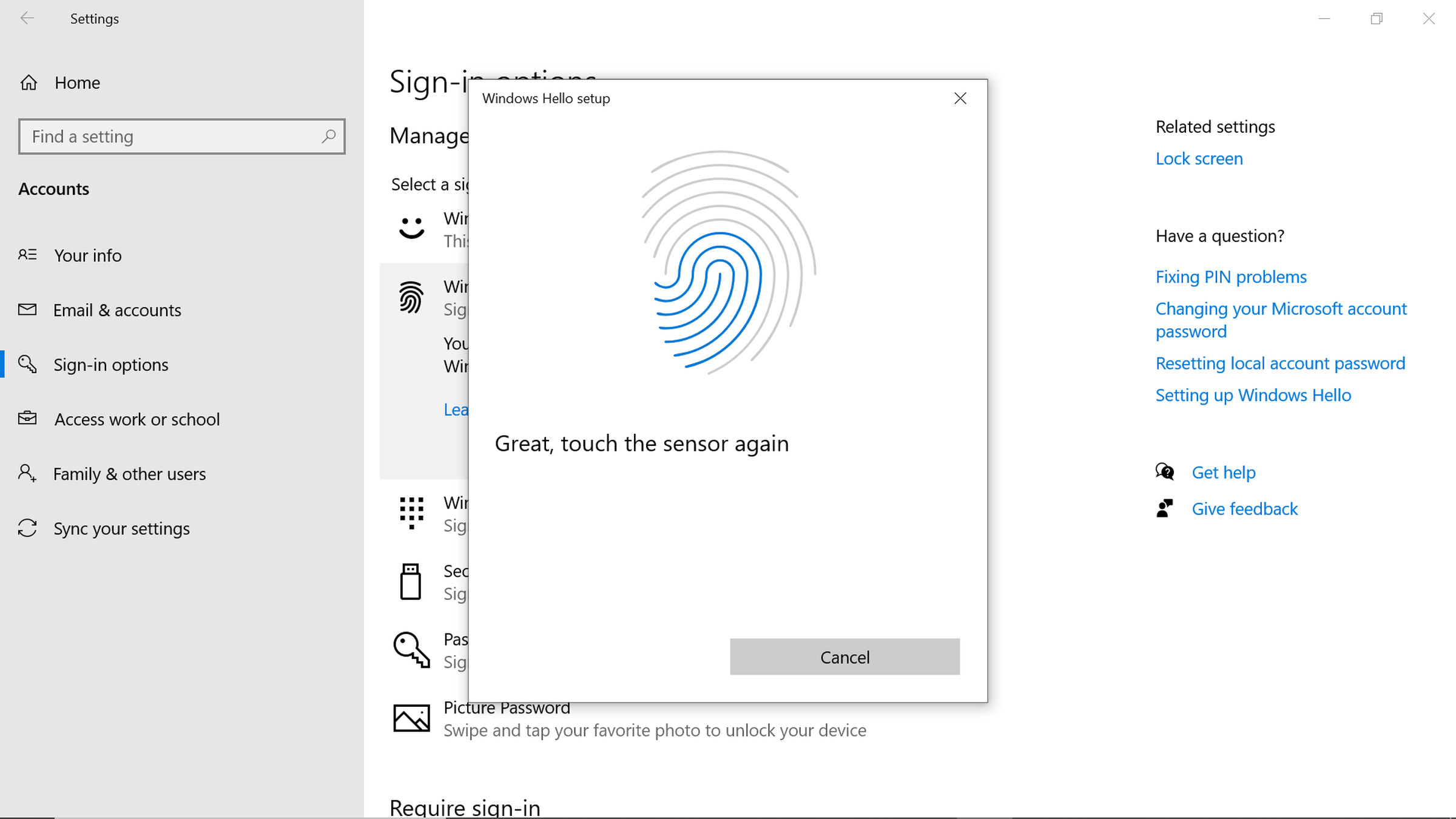 An image of a fingerprint, which is highlighted in blue as the fingerprint is captured. 