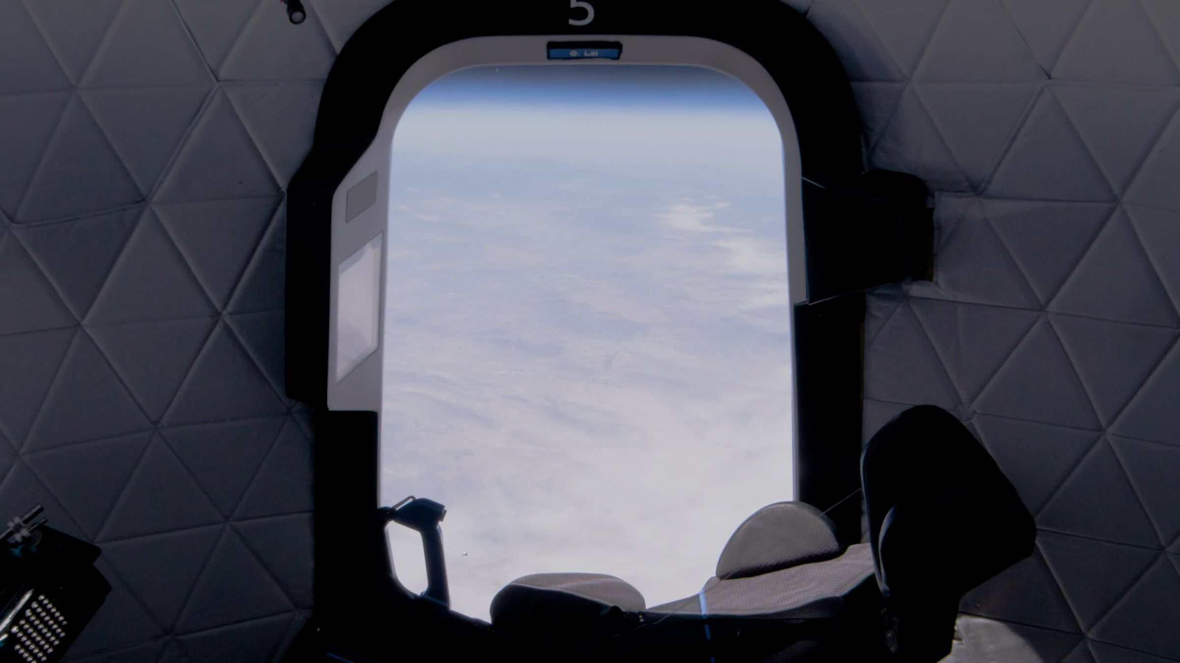 POV from inside Blue Origin’s suborbital crew capsule.