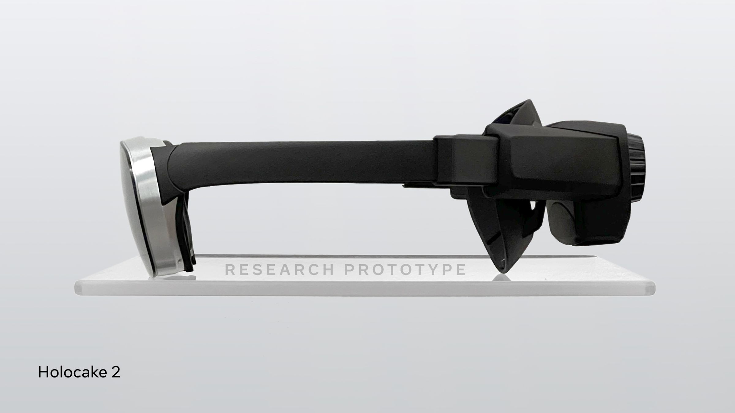 A thin VR headset prototype seen from the side