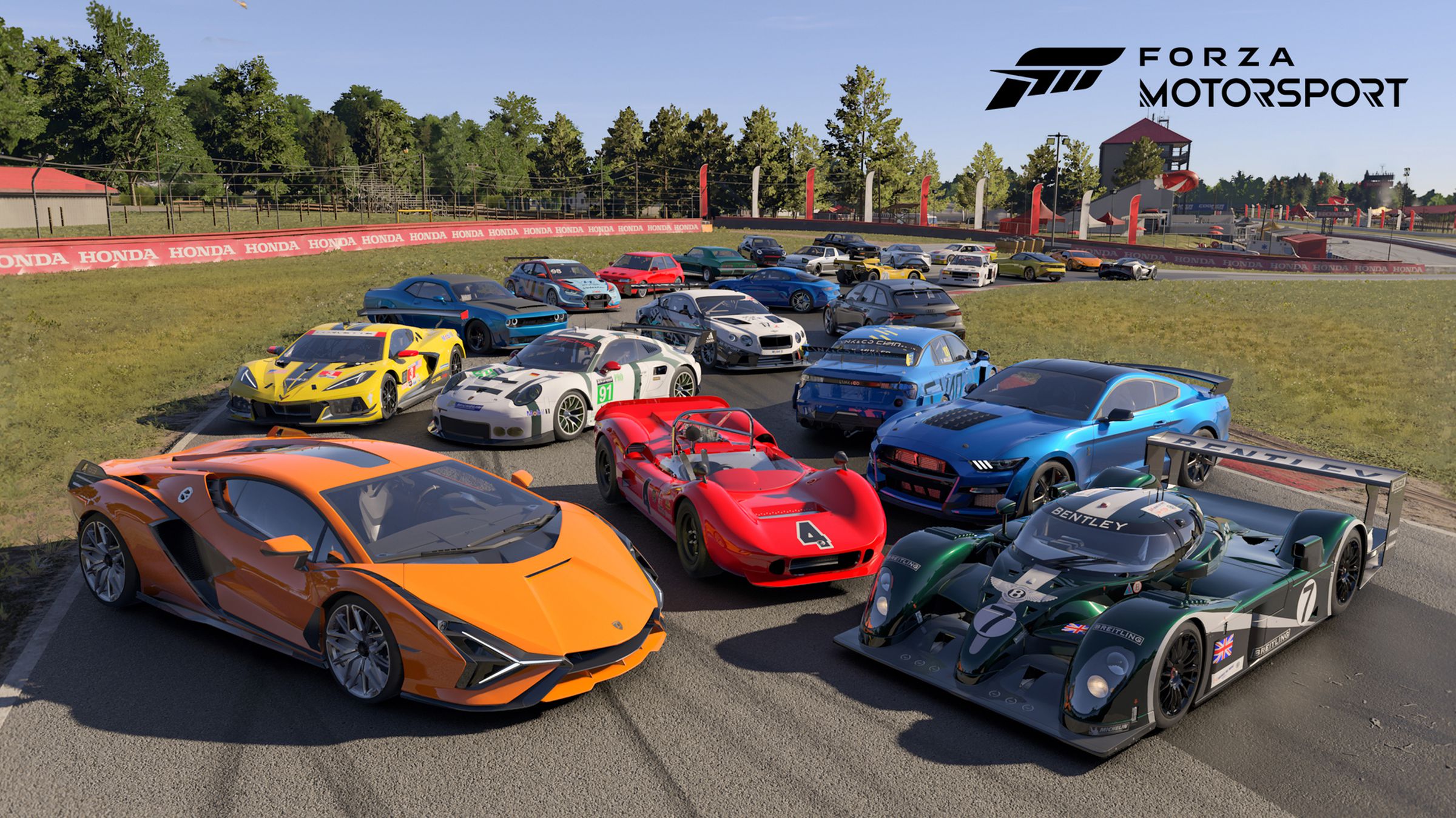Racing and high-performance cars parked on a track in the game Forza Motorsport.