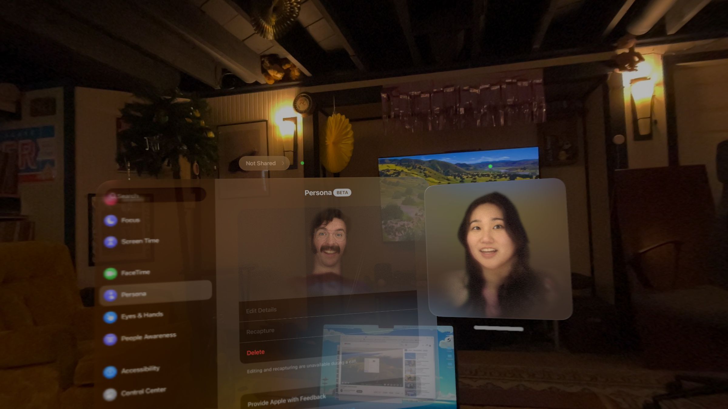 Screenshot of two people talking on FaceTime with Personas in Vision Pro