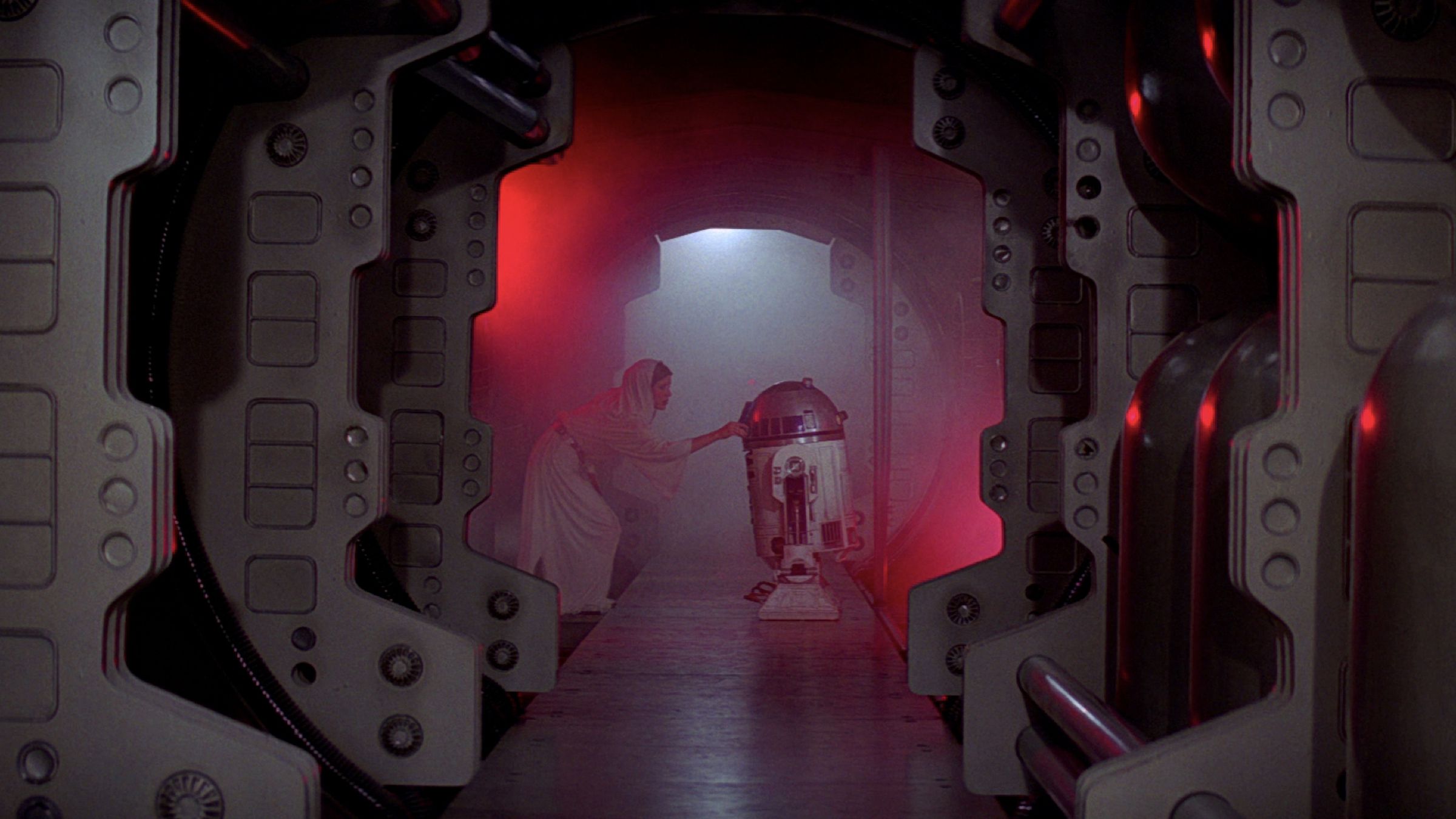 Leia gives the disk to R2-D2 in the opening of A New Hope.