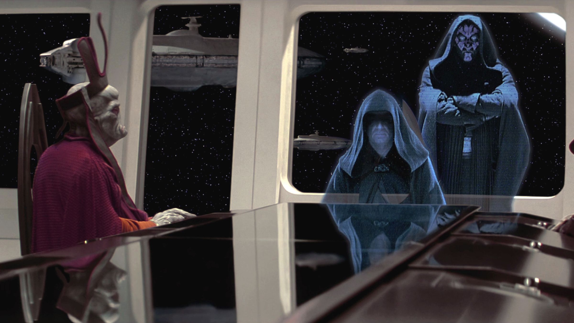 Darth Sidious meets with the Trade Federation via hologram.