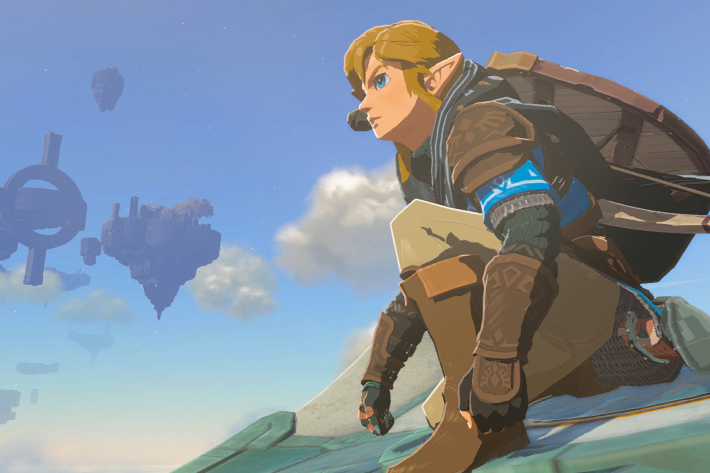 Link on a Wing glider in the sky in a screenshot for The Legend of Zelda: Tears of the Kingdom.