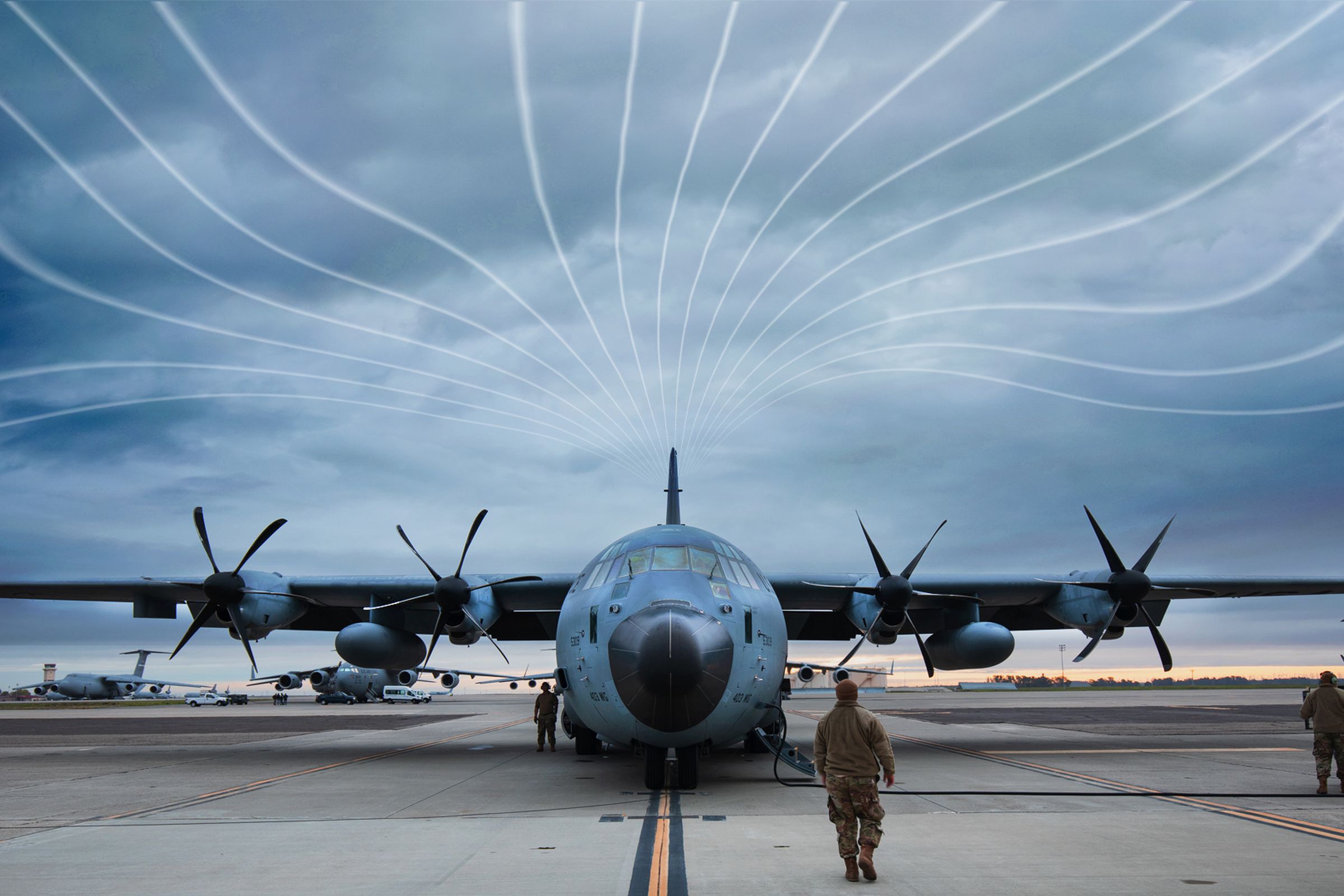 Air Force C130 plane on tarmac, with illustrated “atmospheric river” lines in the sky