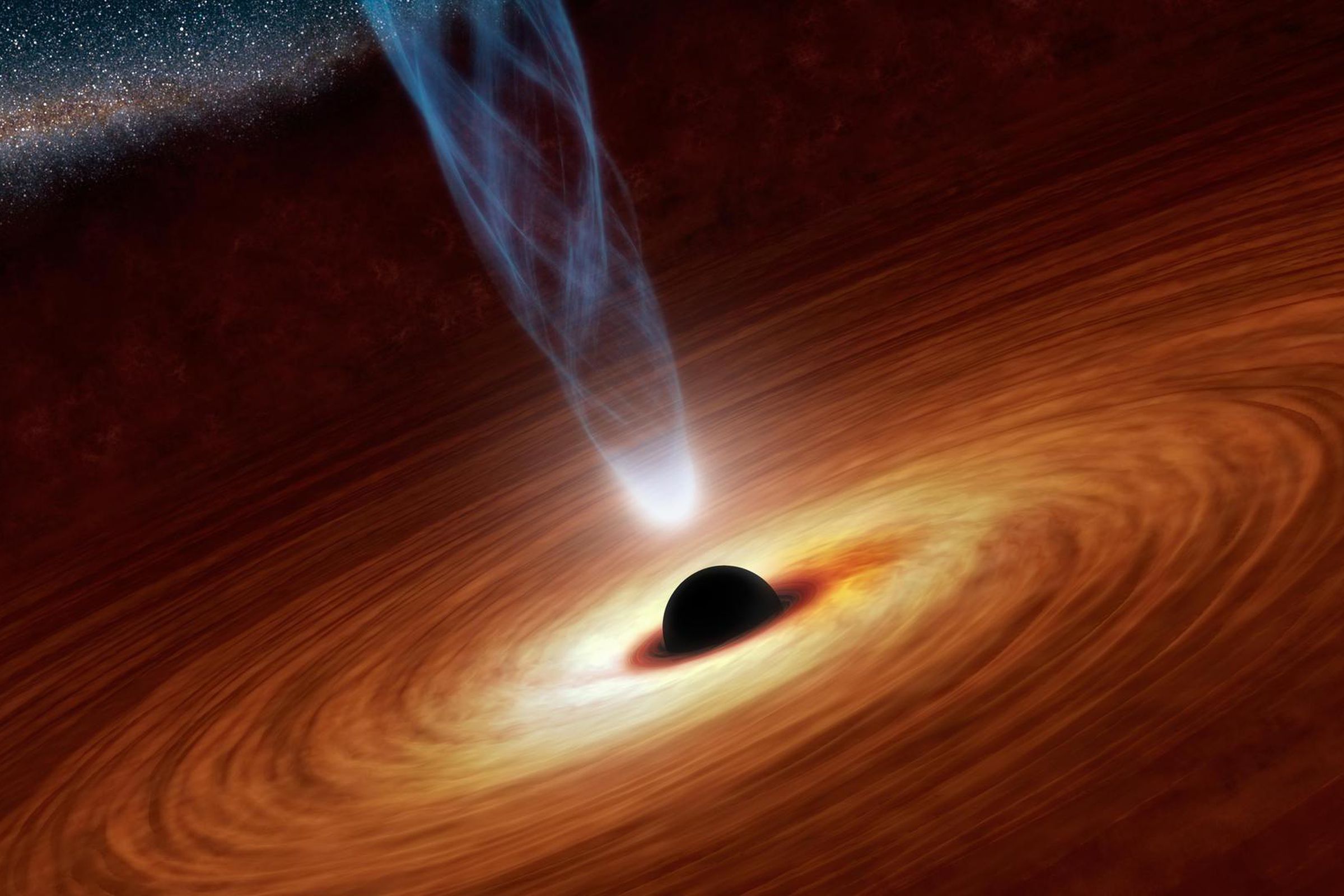 An artistic rendering of a supermassive black hole. All images of black holes have been illustrations like these, but that could change tomorrow.