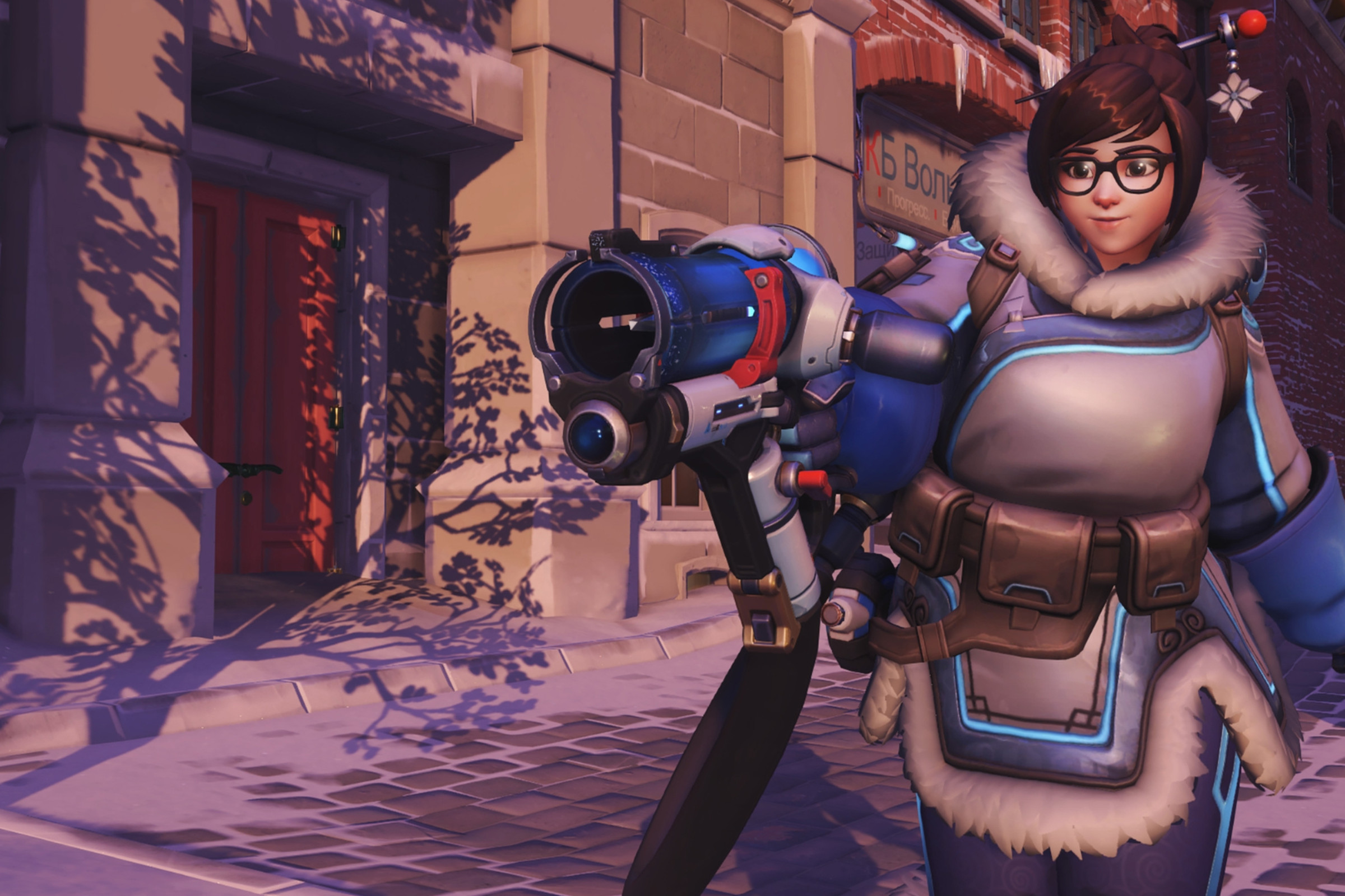 Screenshot from Overwatch featuring the heroine Mei, a medium height Chinese woman in a blue and white winter overcoat and brown hair with a snowflake hair pin sticking out