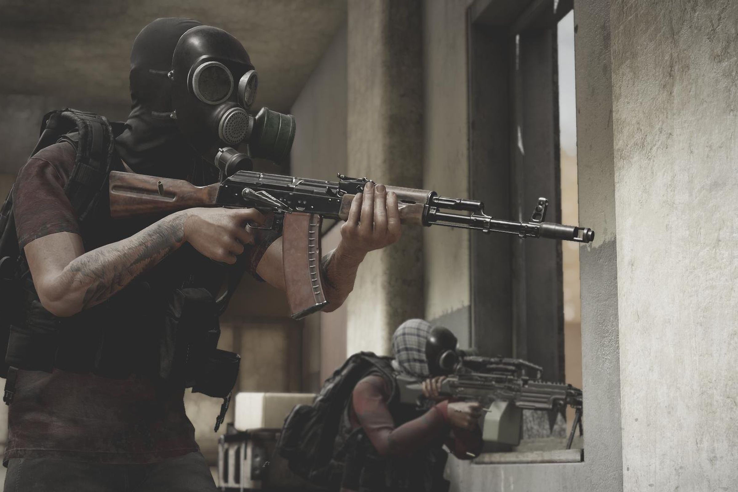 Screenshot from Insurgency: Sandstorm featuring two soldiers in gas masks pointing rifles at enemies off-screen.