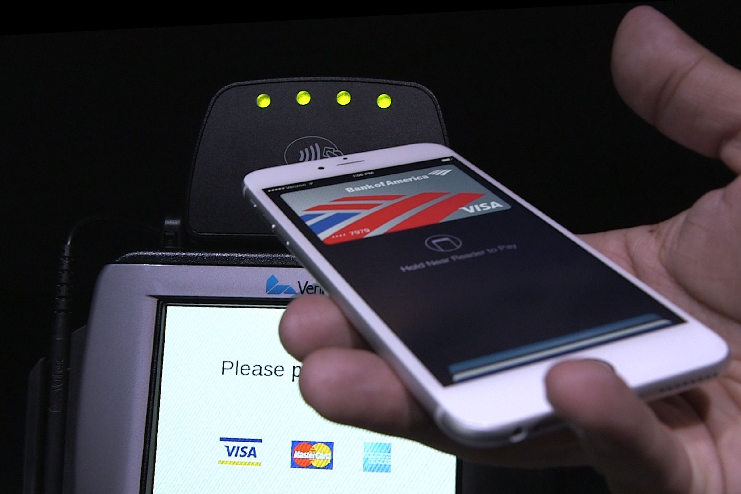 apple pay on a plus-sized iPhone device with Touch ID.