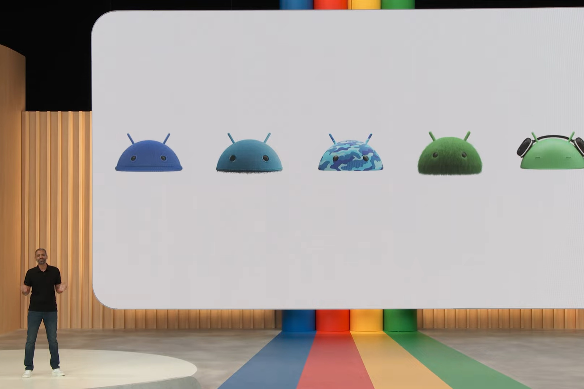 A slide from Google I/O 2023 showing variations of the new 3D Android logo.