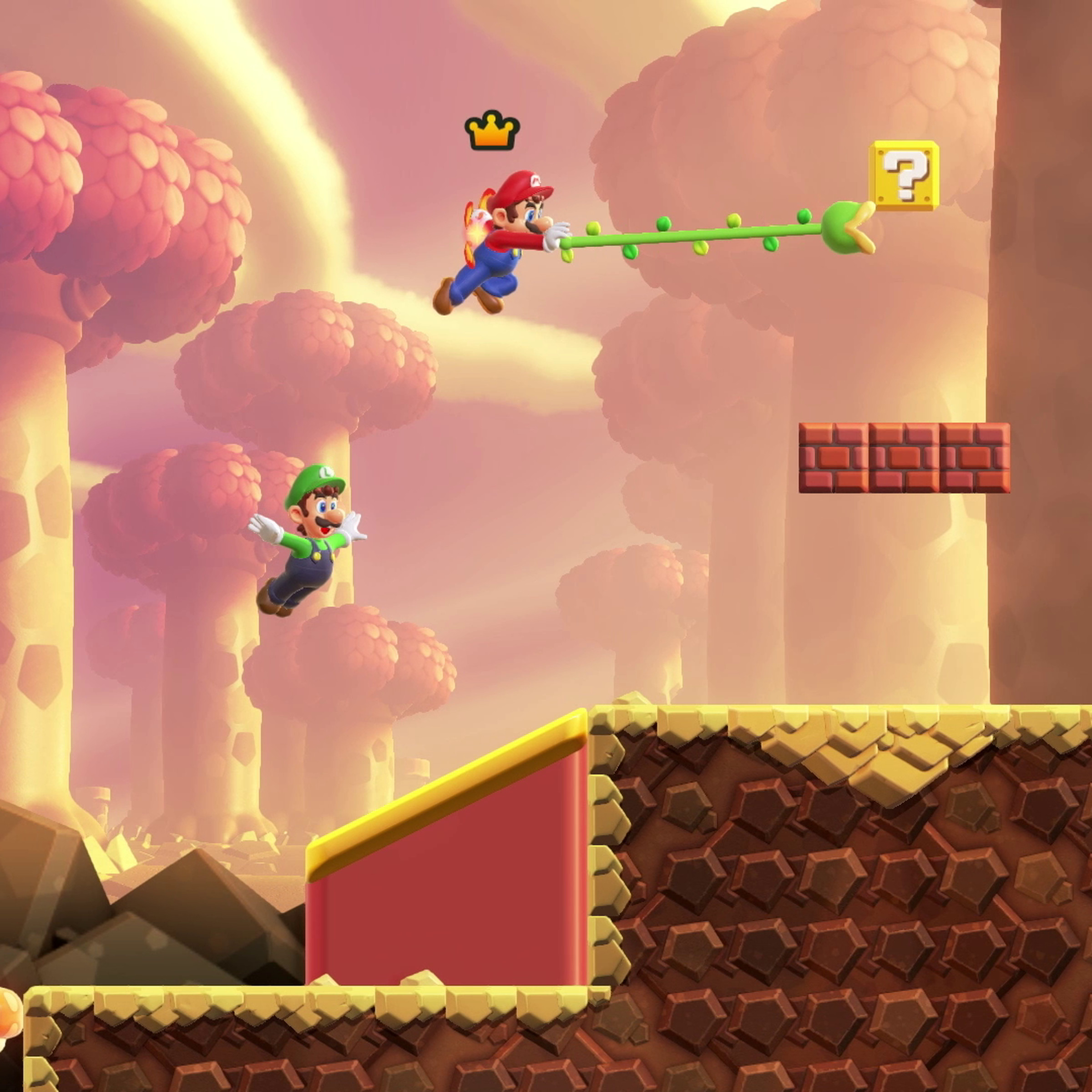 A screenshot from the video game Super Mario Bros. Wonder, in which Mario uses a vine like a grappling hook.