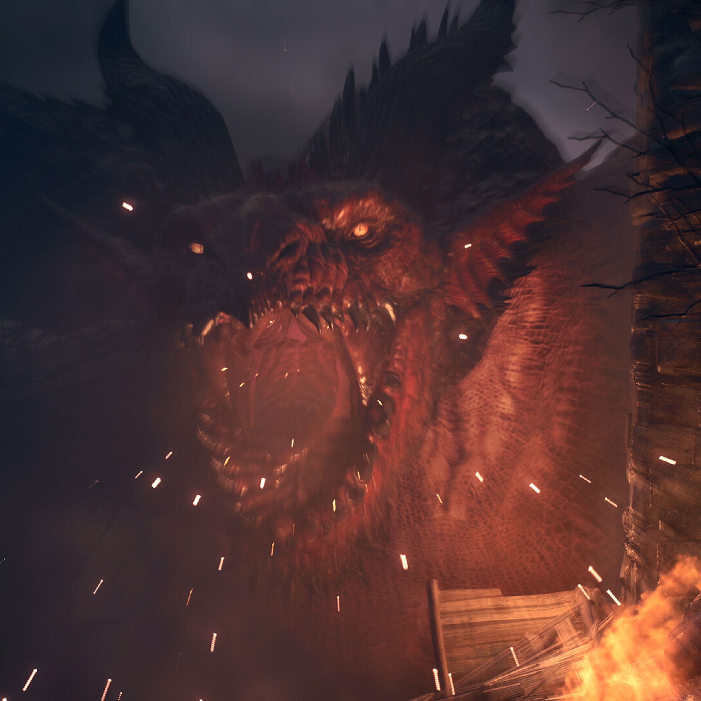 Screenshot from Dragon’s Dogma 2 featuring a large red dragon roaring as flames burn around the edges of the image