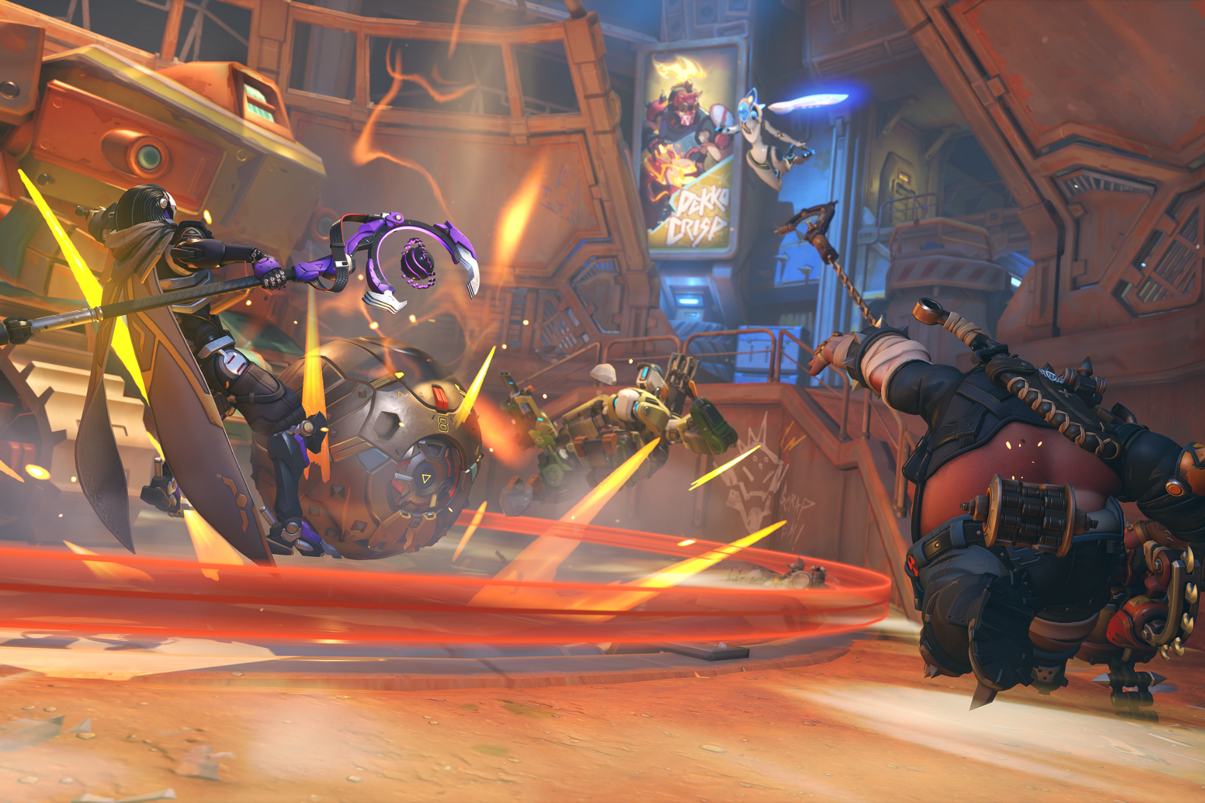 Screenshot from Overwatch 2 featuring a team fight in the new Flashpoint map New Junk City including the heroes Wrecking Ball, Ramattra, Echo, Roadhog and Bastion fighting over a control point