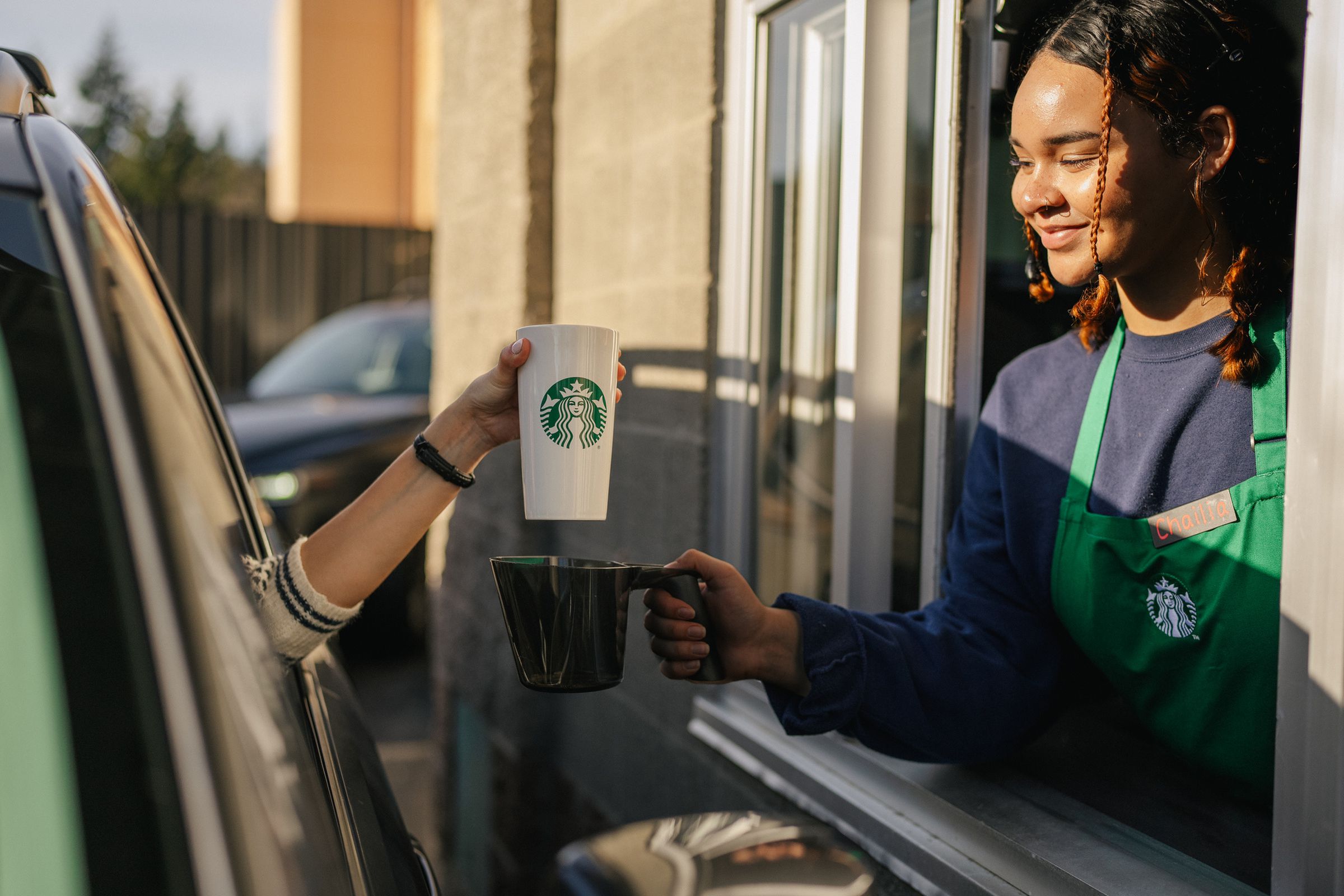 Starbucks will let customers drive-through with reusable cups at all US and Canada stores.