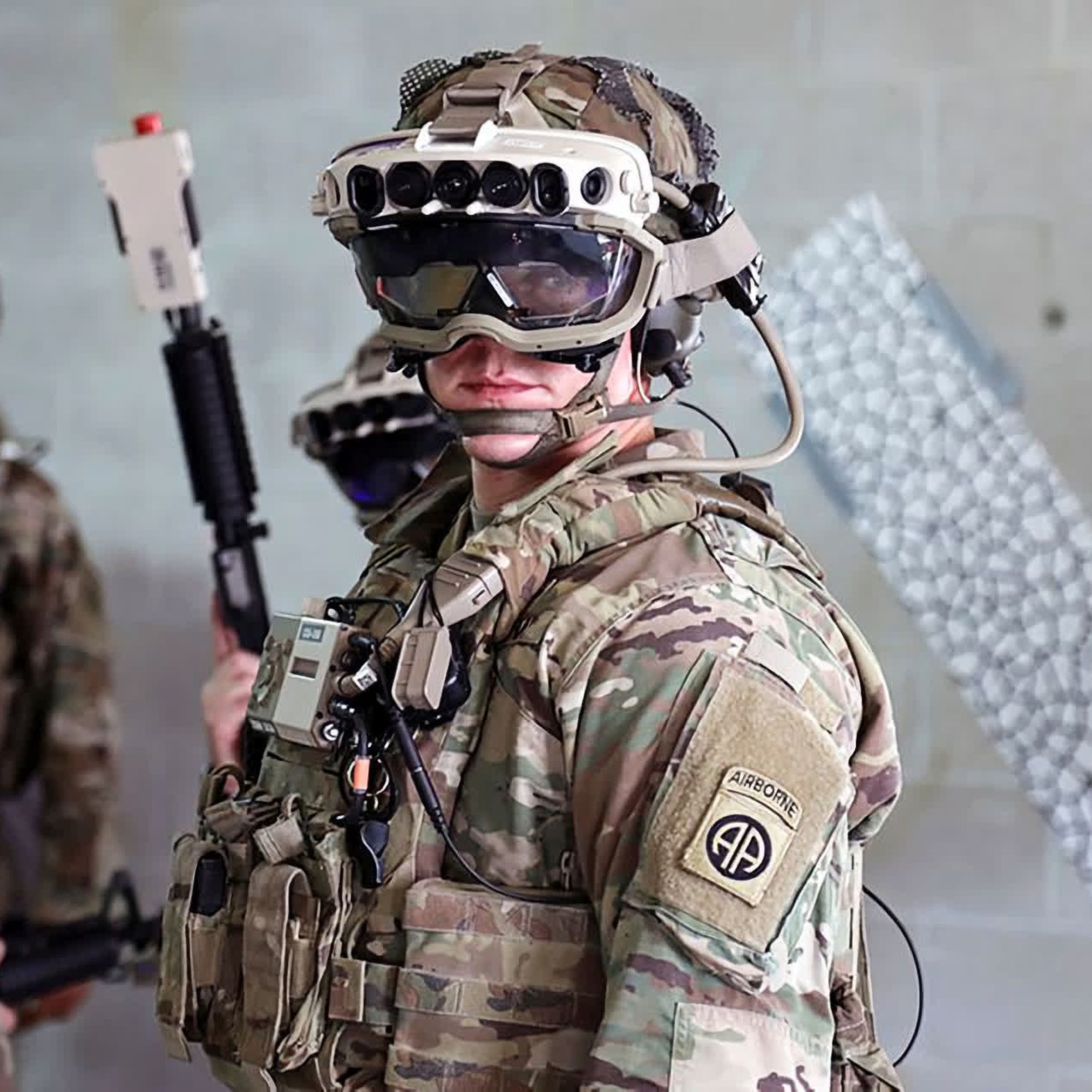 An undated photo shows a US soldier in fatigues wearing a bulky AR headset.